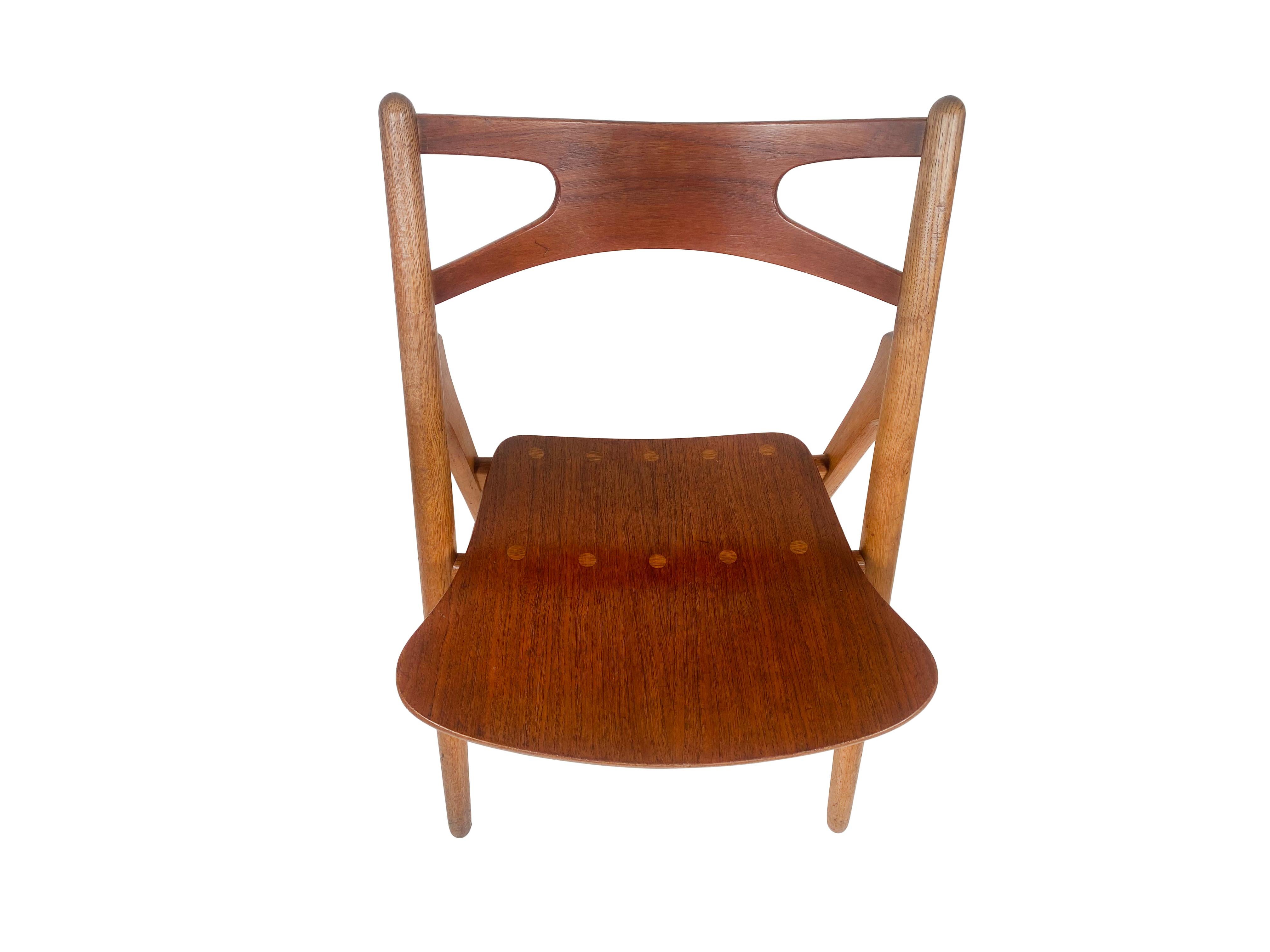 Hans J. Wegner, set of four 'Sawbuck' CH29 chairs, teak and oak, Denmark 1950s 1