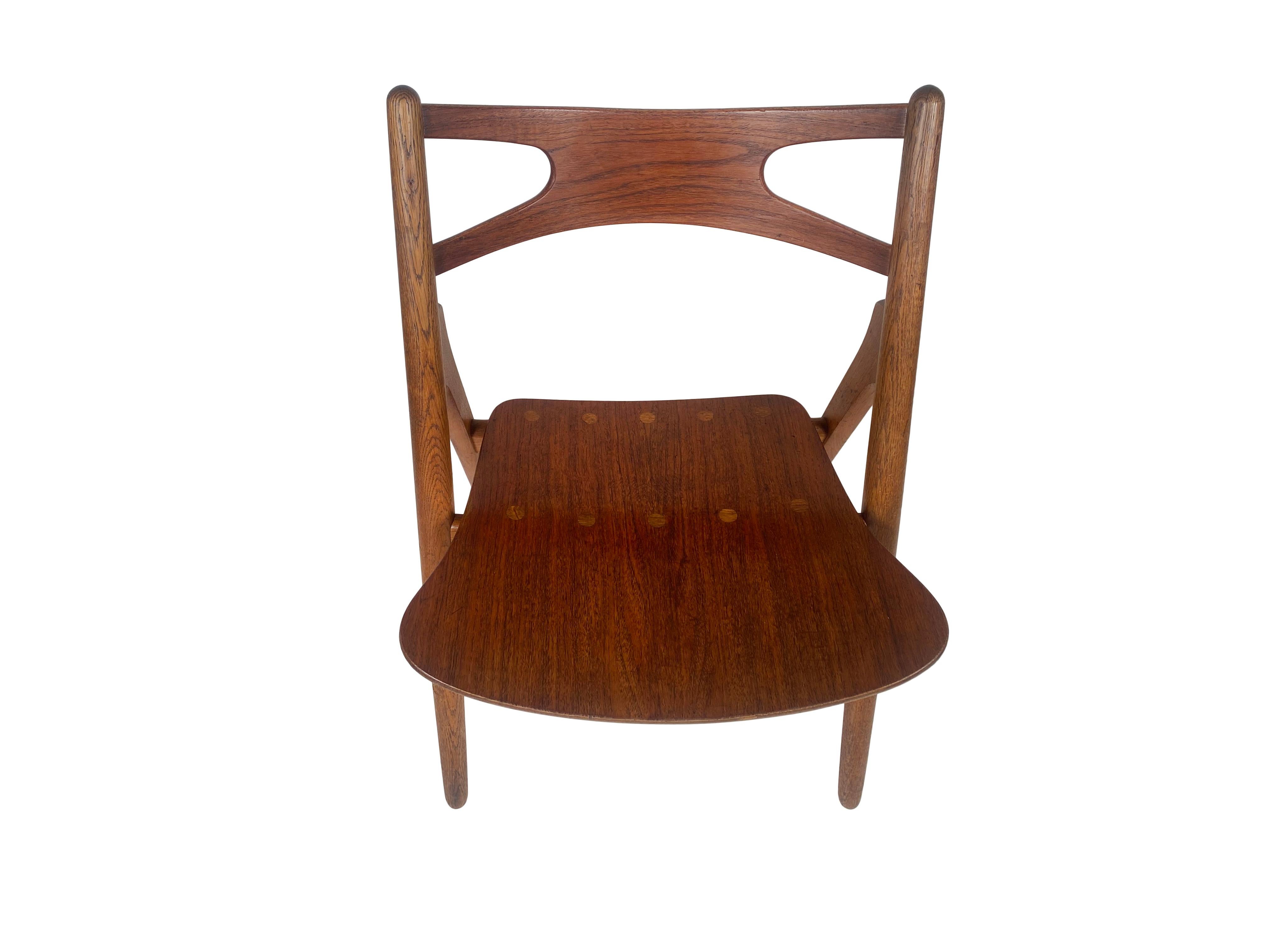 Hans J. Wegner, set of four 'Sawbuck' CH29 chairs, teak and oak, Denmark 1950s 2