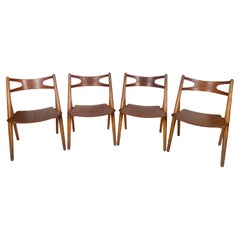 Hans J. Wegner, set of four 'Sawbuck' CH29 chairs, teak and oak, Denmark 1950s