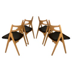 Hans J. Wegner, set of four 'Sawbuck' CH29 dining chairs in wood/leather Denmark