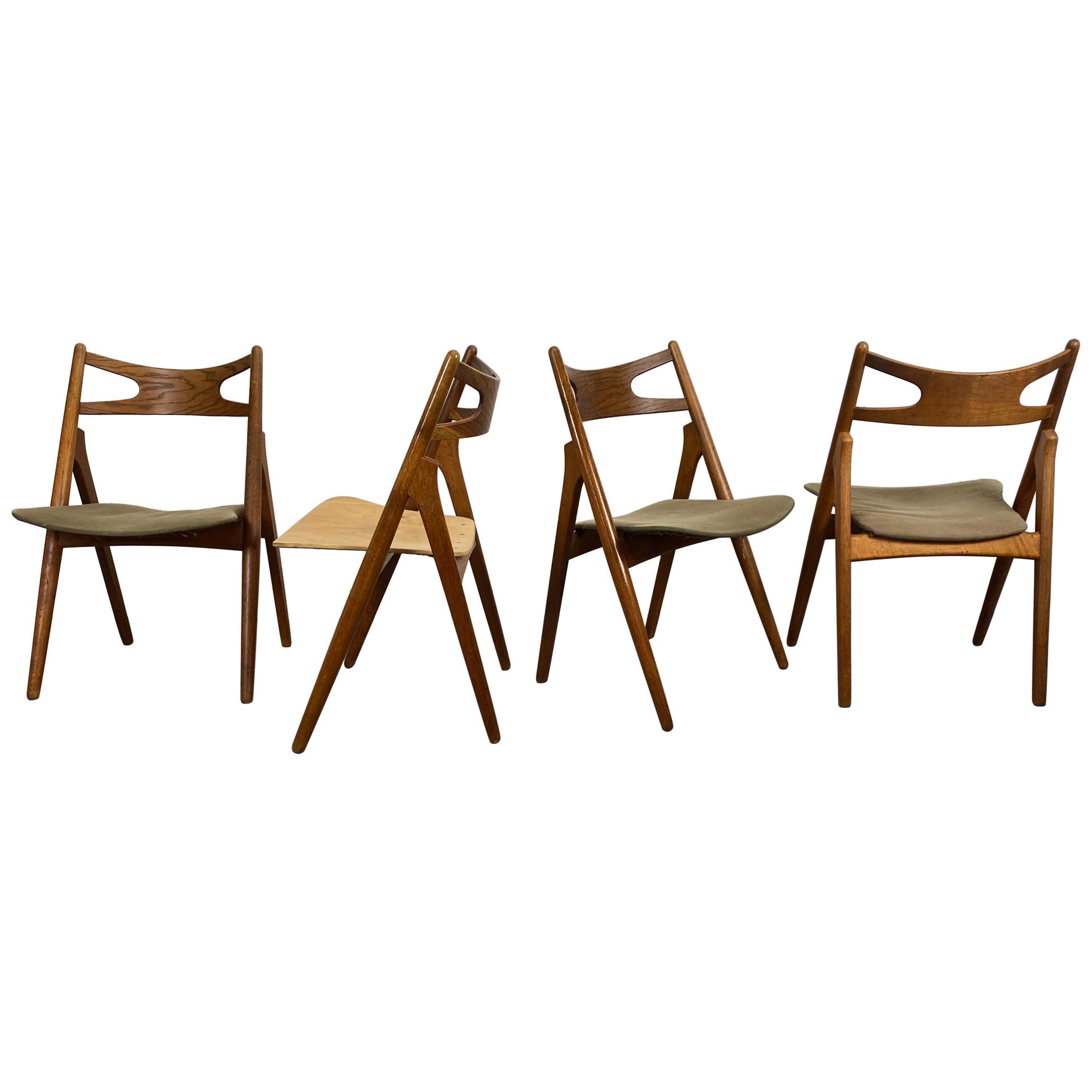 Hans J. Wegner Set of Four Sawbuck Chairs, Early Set in Oak, circa 1952, Denmark