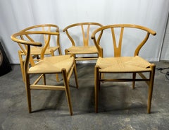 Hans J. Wegner Set of Four “Wishbone” Chairs in Oak, Carl Hansen & Son