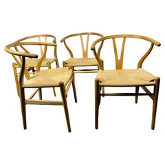 Hans J. Wegner Set of Four “Wishbone” Chairs in Oak, Carl Hansen & Son
