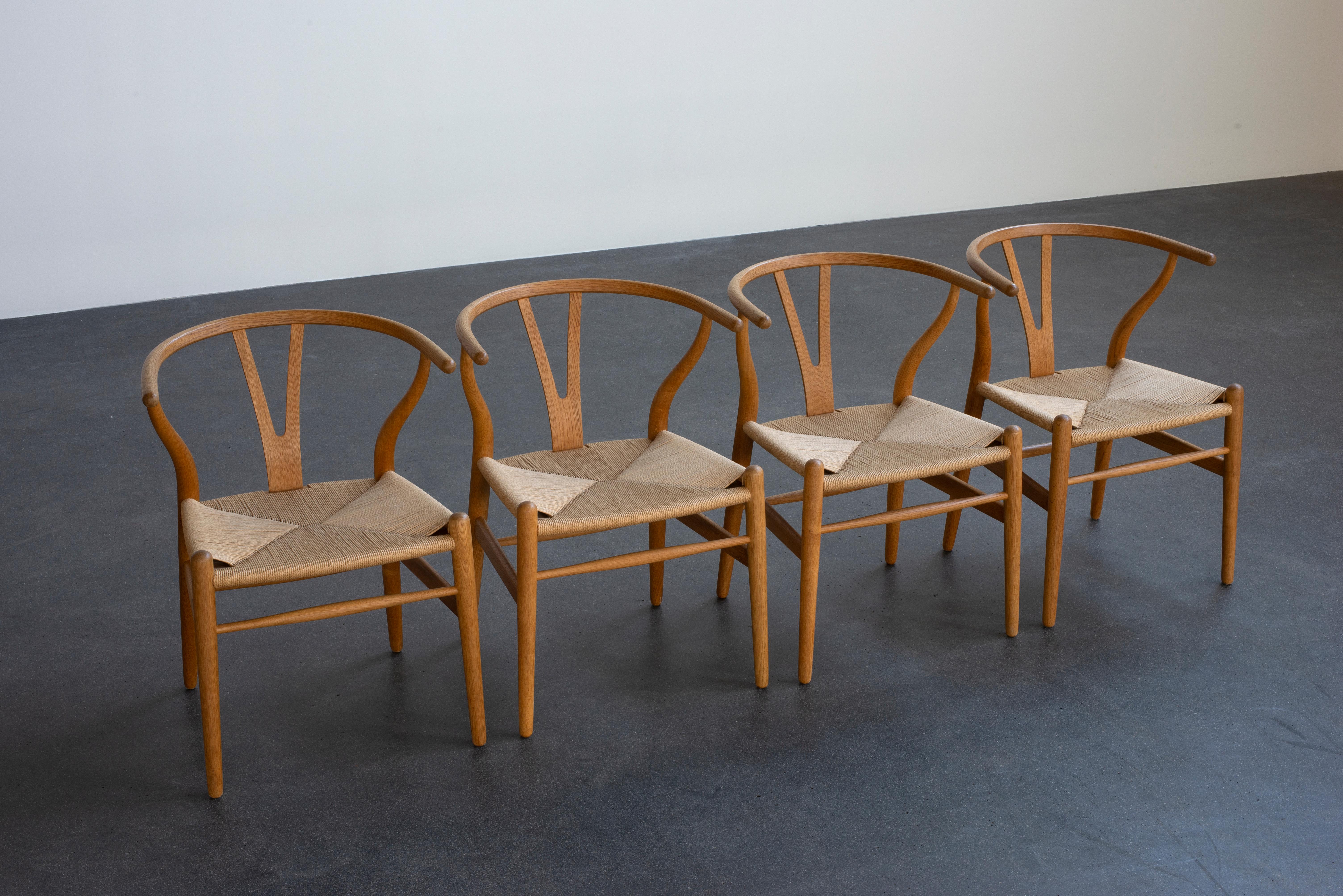 Danish Hans J. Wegner Set of Four “Wishbone” Chairs in Oak