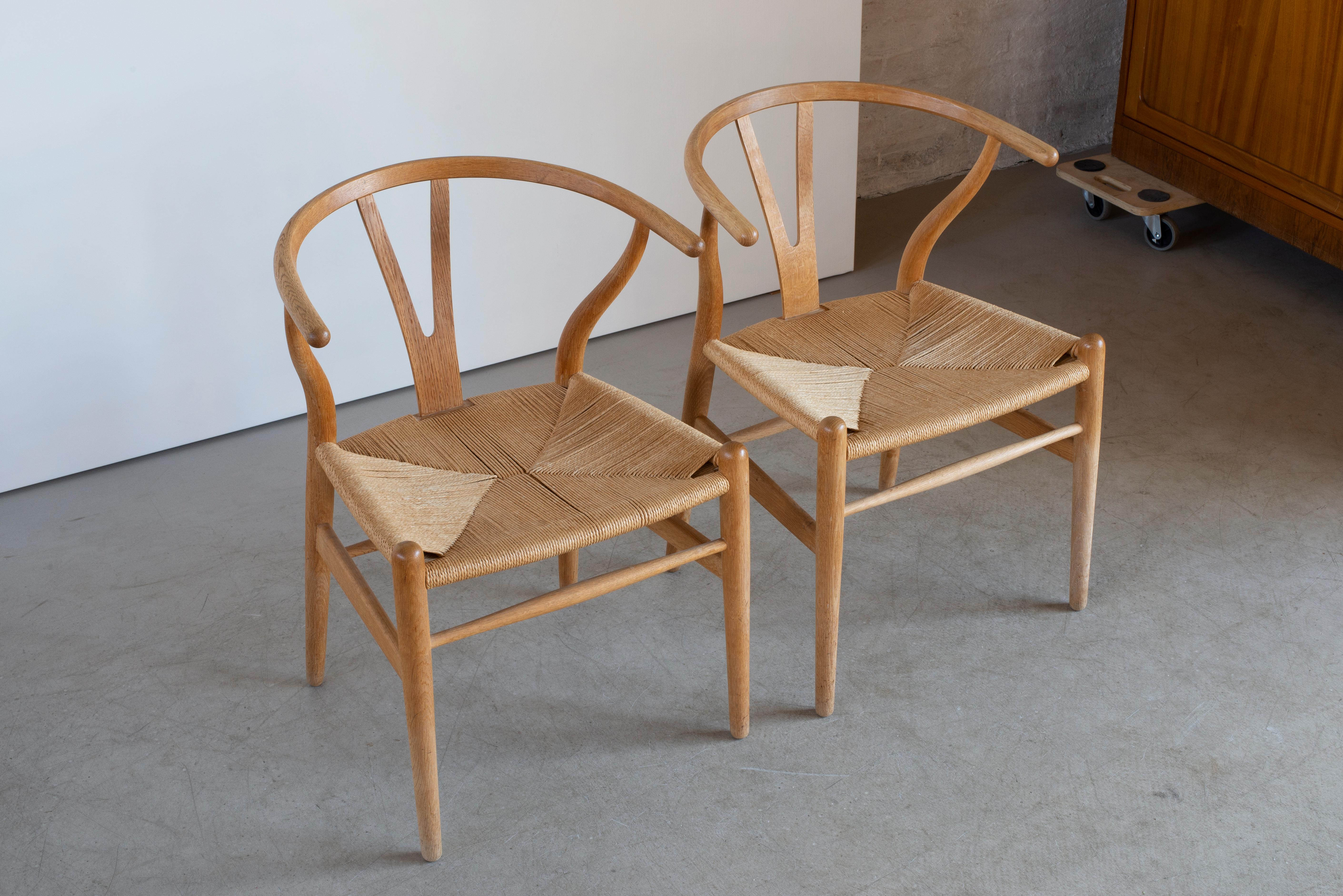 Polished Hans J. Wegner Set of Six “Wishbone” Chairs in Oak For Sale