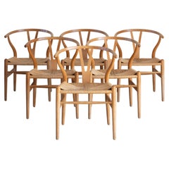 Hans J. Wegner Set of Six “Wishbone” Chairs in Oak