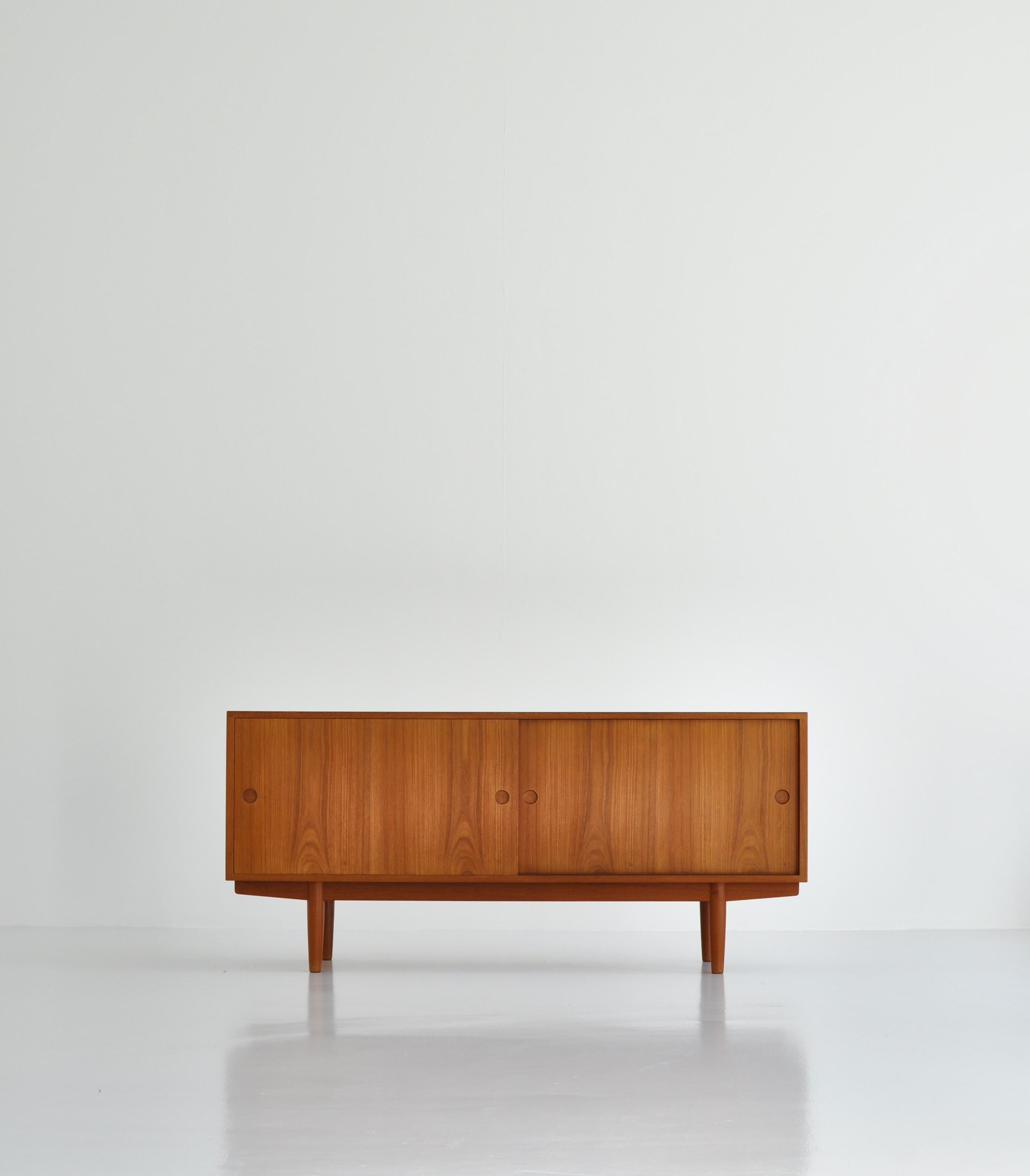 Rare sideboard designed by Hans J. Wegner and made at master cabinetmaker Johannes Hansens workshop. The sideboard is made for freestanding in the room and is in great condition.