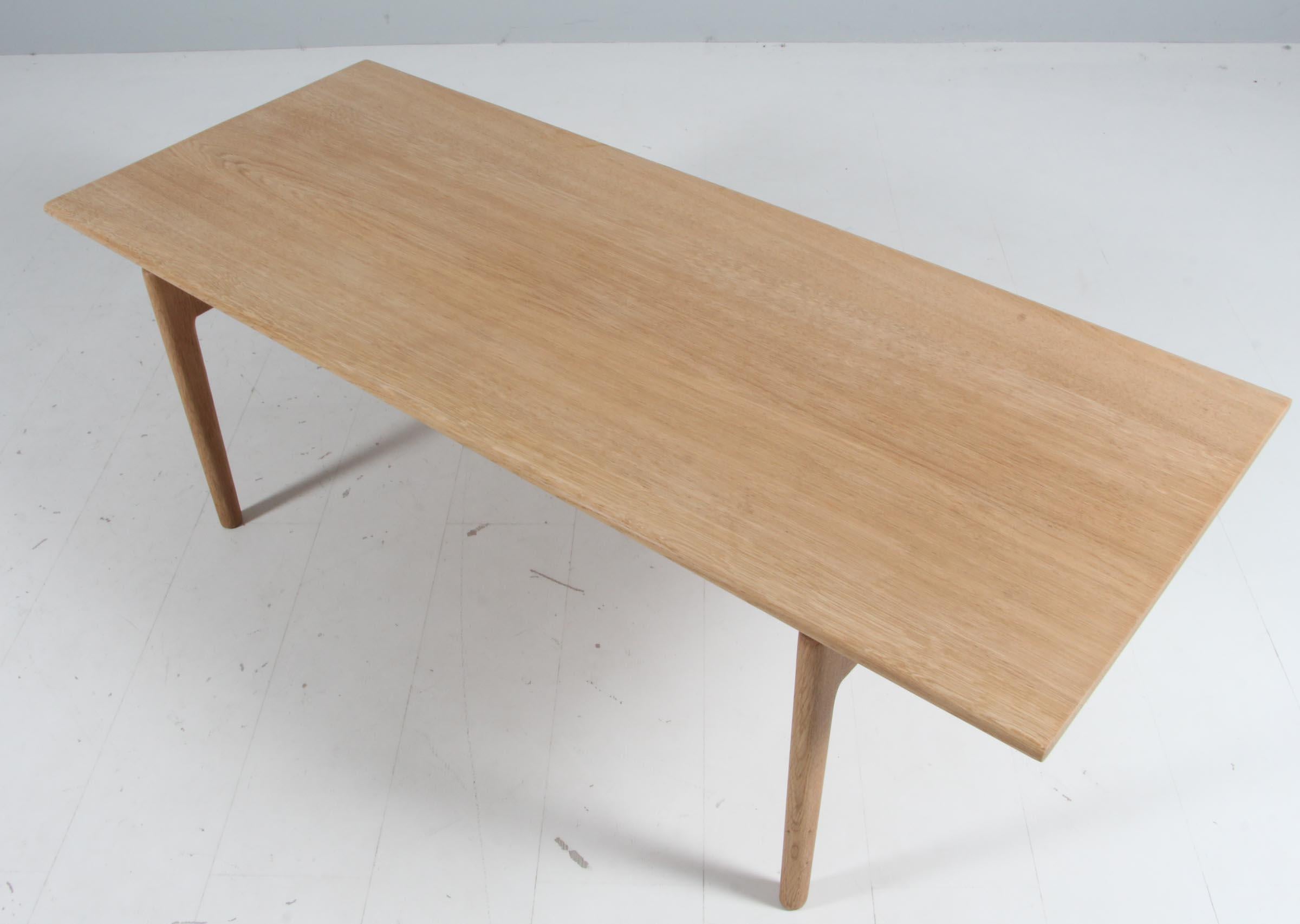 Hans J. Wegner sofa table made in solid soap treated oak.

Model AT15, made by Andreas Tuck.