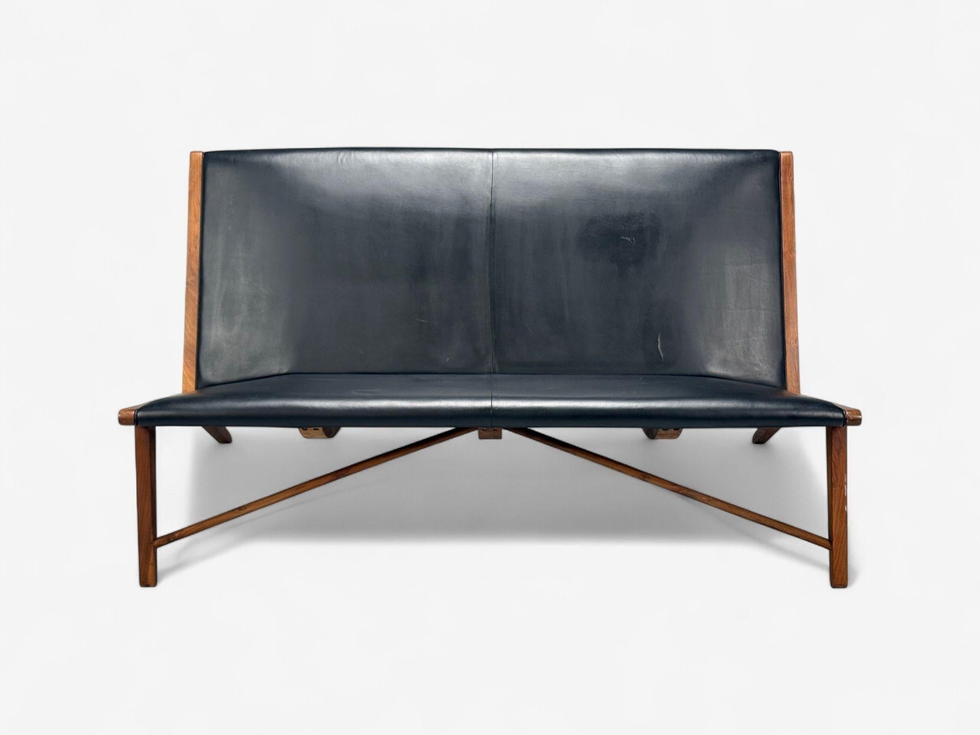Divano in stile Hans J. Wegner, teak, similpelle, Danimarca, anni '50

Un divano o una panca unica nel suo genere, nello stile del rarissimo modello JH-555 di Hans Wegner per Johannes Hansen in Danimarca alla fine degli anni '40.

Teak, similpelle;