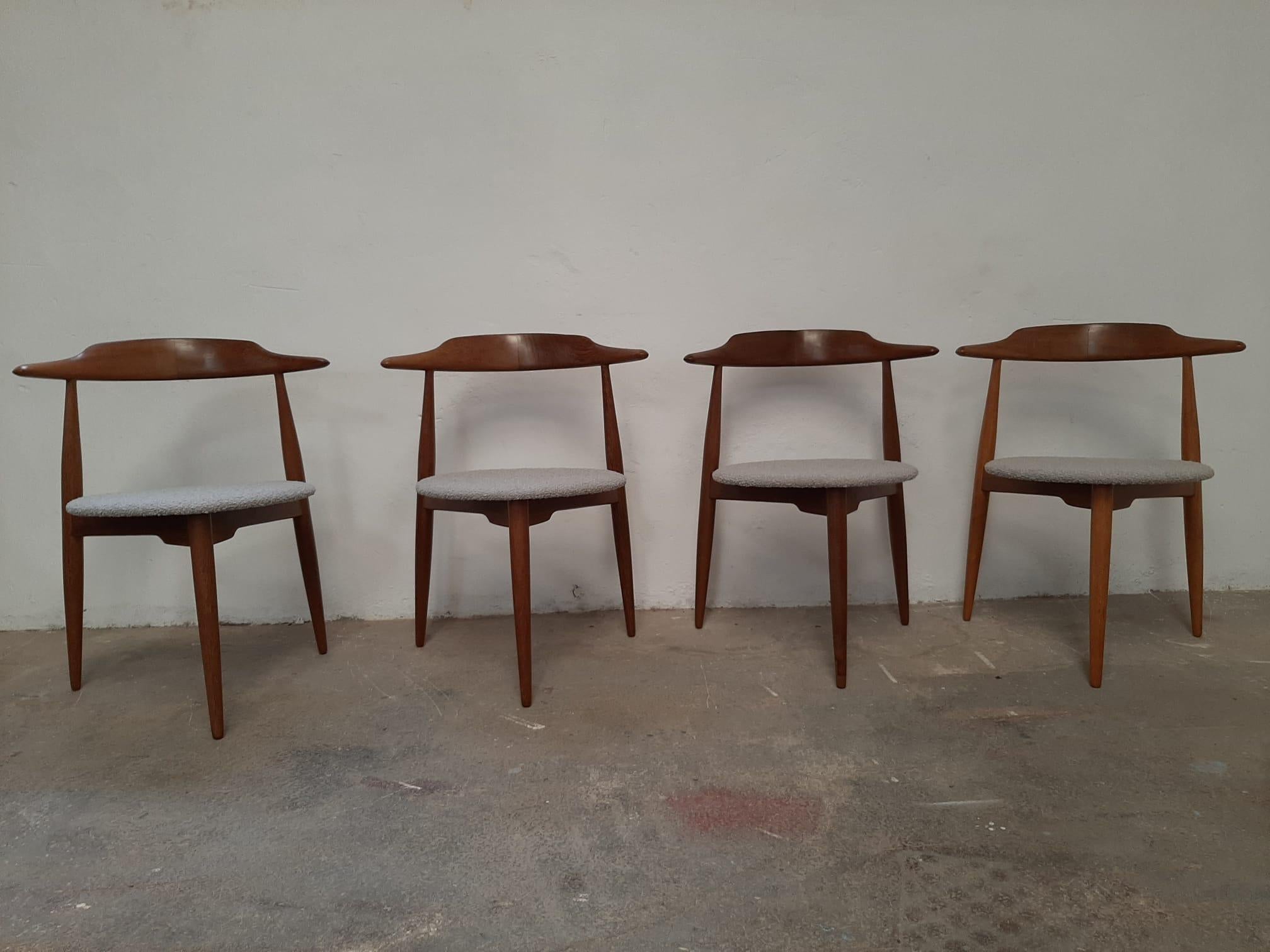 Set of Four Hans J. Wegner style three-legged heart chair, made in Denmark in the 1960s
Walnut wood structure
Reupholstered in Bisson Bruneel fabric

APPROX. DIMENSIONS:
Width 60cm (23-2/3in.)
Depth 50cm (19-2/3in.)
Height 75cm (29-1/2in.)
Seat