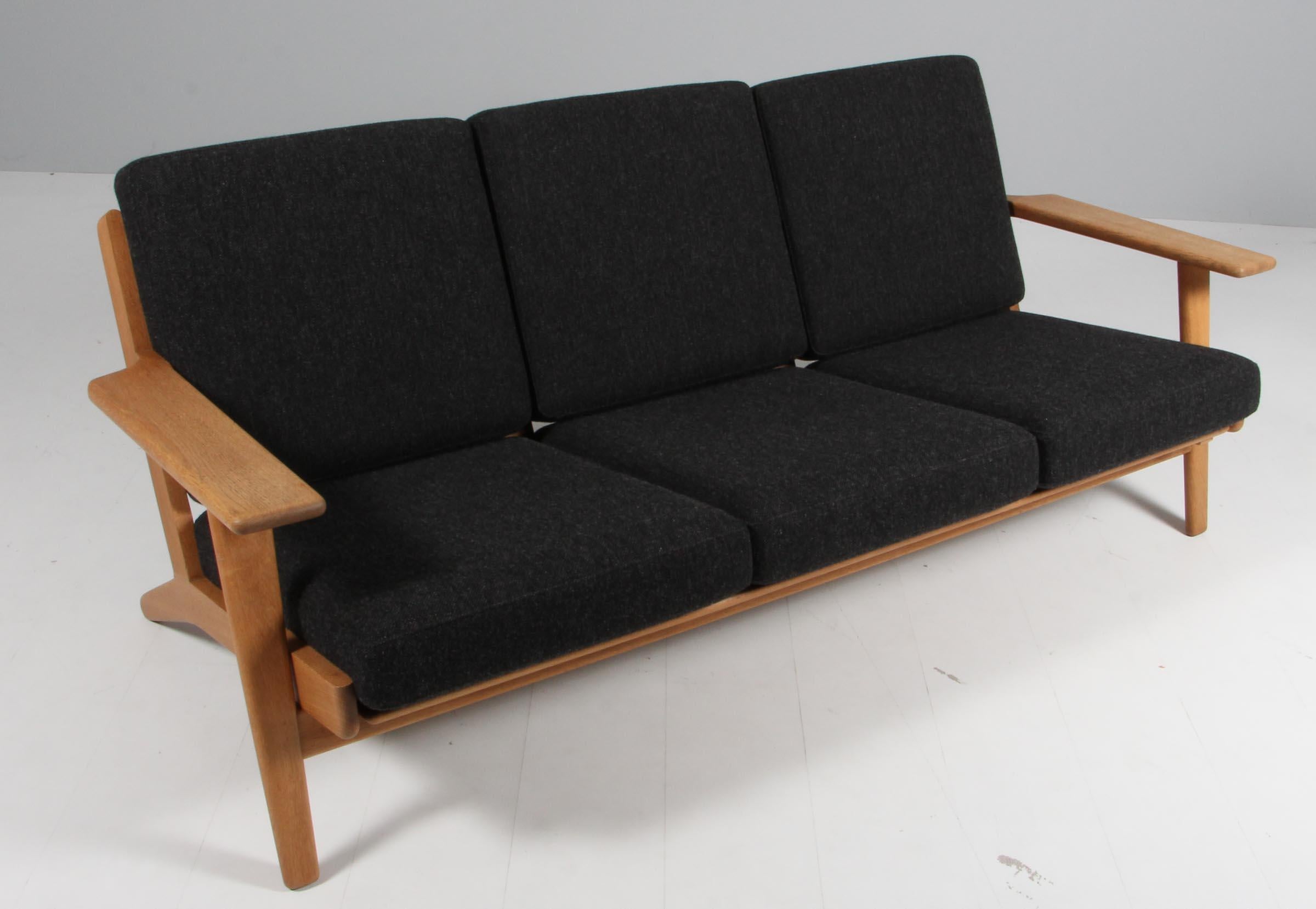 Hans J. Wegner three-seat sofa made of solid soap treated oak.

New upholstered with Hallingdal 180 from Kvadrat

Model 290, made by GETAMA.

