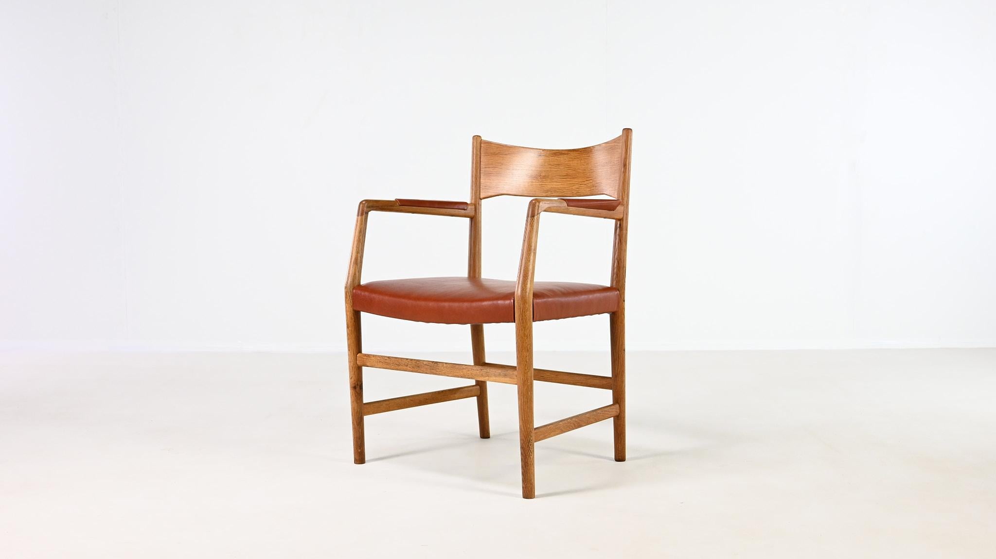 Danish Hans J. Wegner, Town Hall chair. Oak and Leather. Denmark C.1940 For Sale