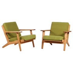 Hans J. Wegner Two Lounge Chairs GE 290 of Oak and Green Wool by GETAMA, 1970s