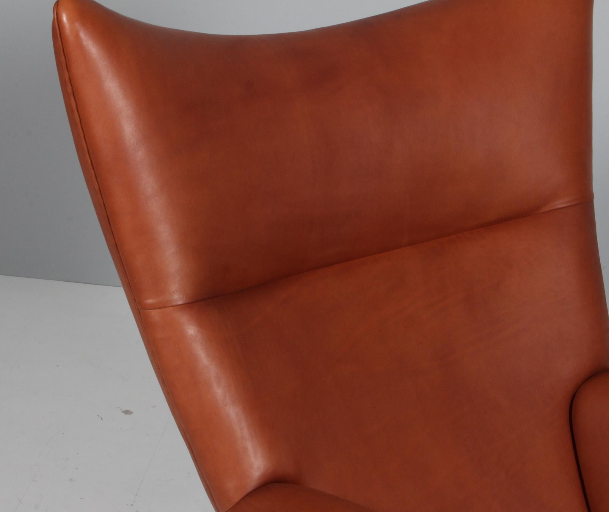 Late 20th Century Hans J. Wegner wing chair and ottoman in full grain leather, model CH445