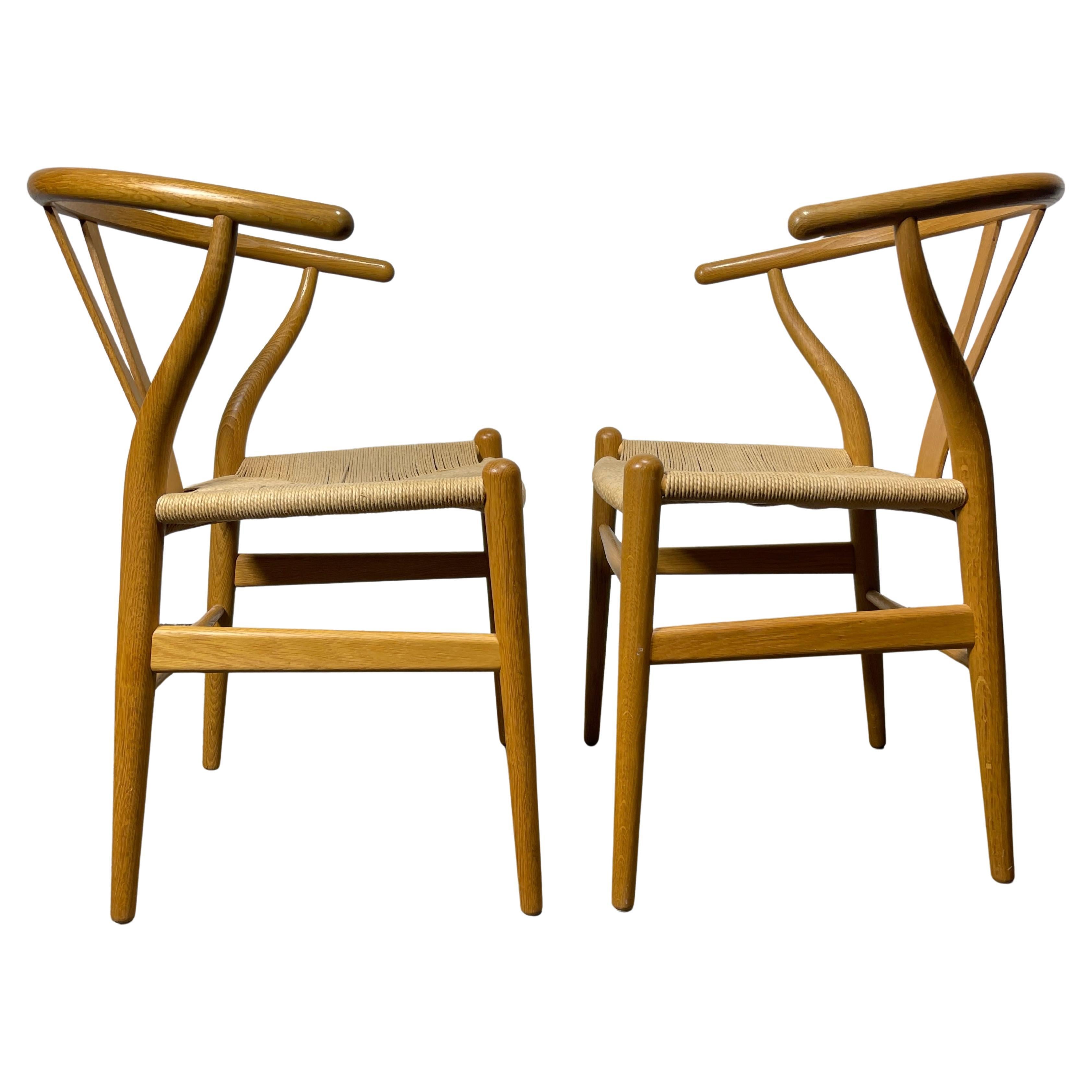 Hans J. Wegner Wishbone chairs, matched pair for Carl Hansen 
Søn