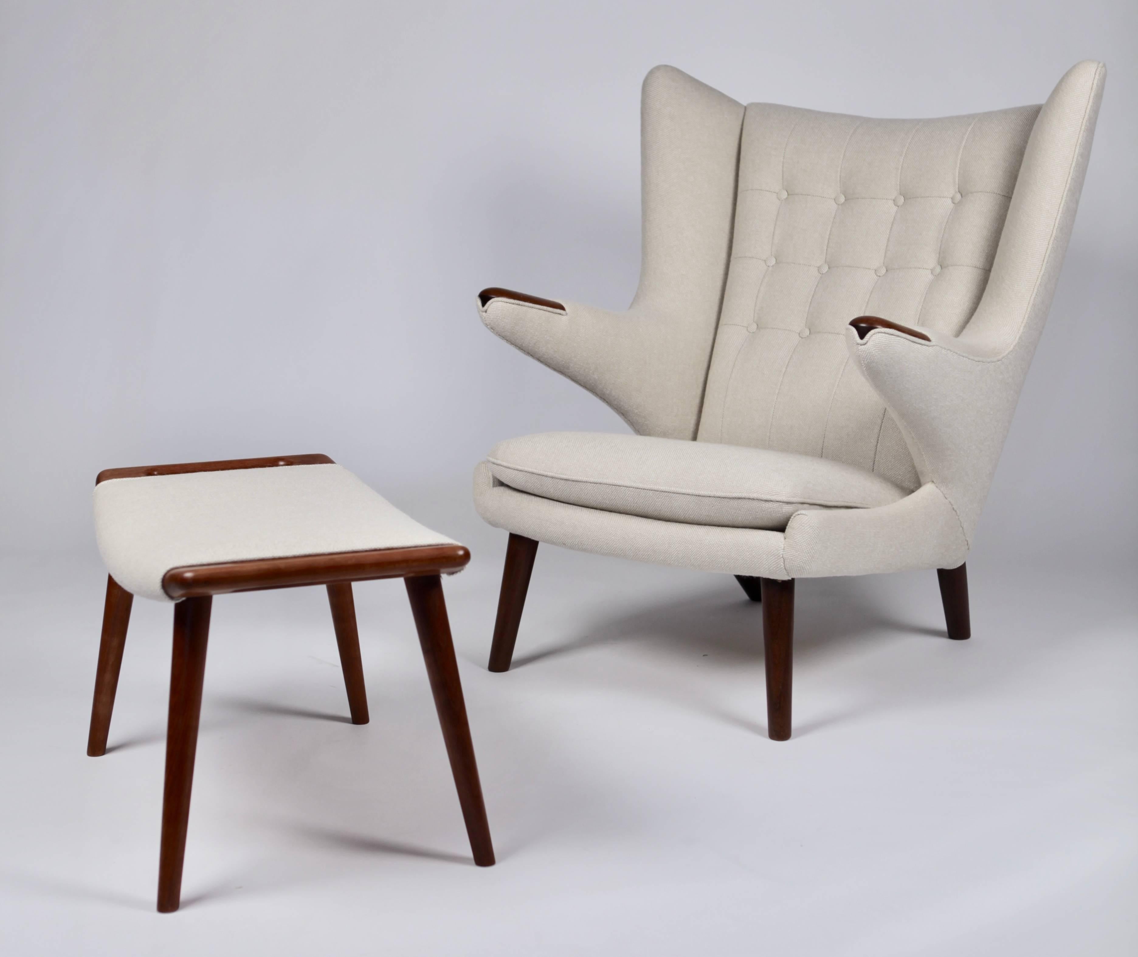 Hans J. Wegner.
Papa bear lounge chair AP 19 and footstool AP 29
Excellent restored, preserving the great patina to the teak.
New upholstered in heavy wool.
Both signed to the underside and bearing the Danish Furniture Control label.
 