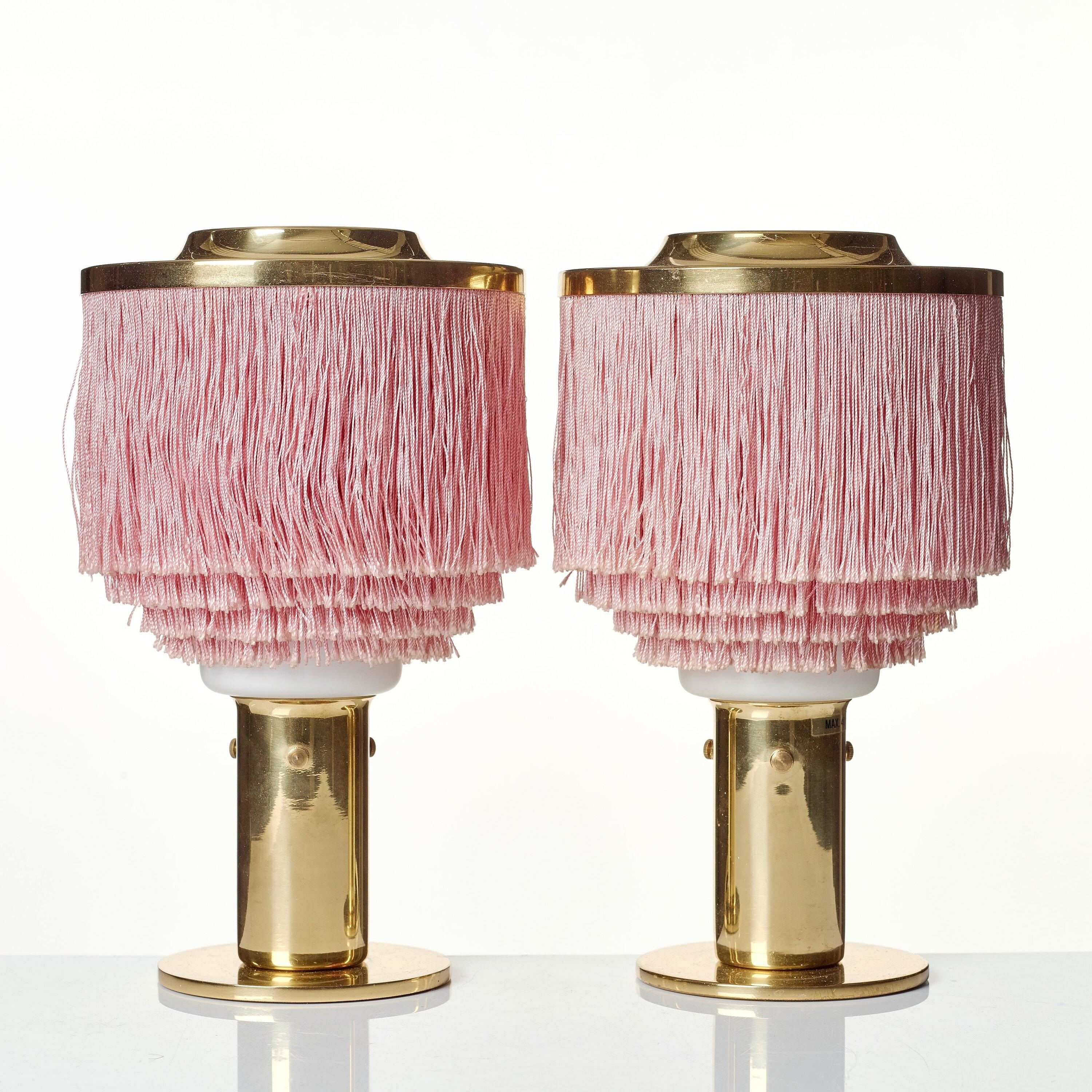 A beautiful pair of table lamps designed by Hans-Agne Jakobsson & manufactured by HAJ AB in Markaryd, Sweden, 1960s.
Pink silk fringes, brass and white glass.
Both signed to the underside.
Very good vintage condition.