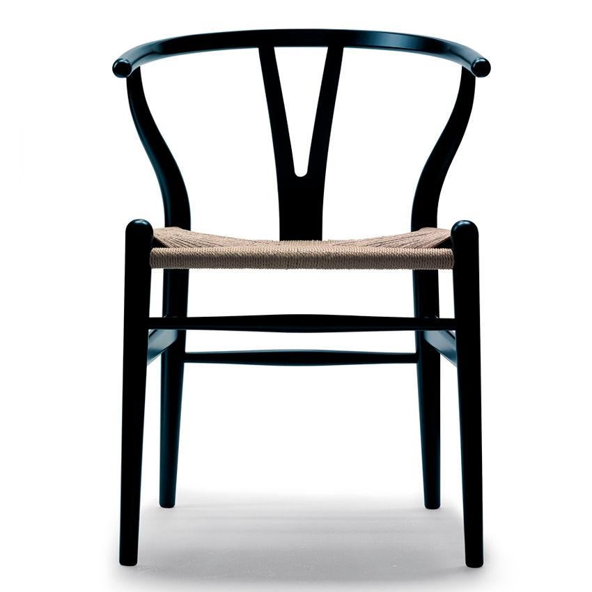 Chair 'CH24' by Hans Jorgen Wegner, solid black lacquered wood with woven rope seat. (Six chairs available)
Embossed with the manufacturer's name. Six chairs available
Production Carl Hansen & Son, Denmark, circa 1960.