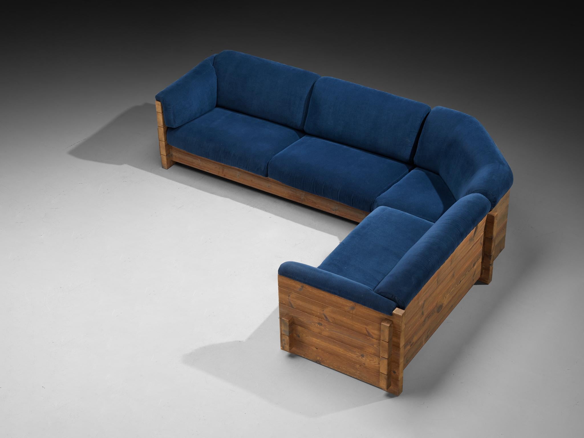 Hans Jørgen Frydendal for Modul Bygge System, corner sofa, solid pine, fabric, Denmark, 1960s

Hans Jørgen Frydendal created a sofa that directs all focus towards the inherent quality of solid pine and the constructive components of the design. The