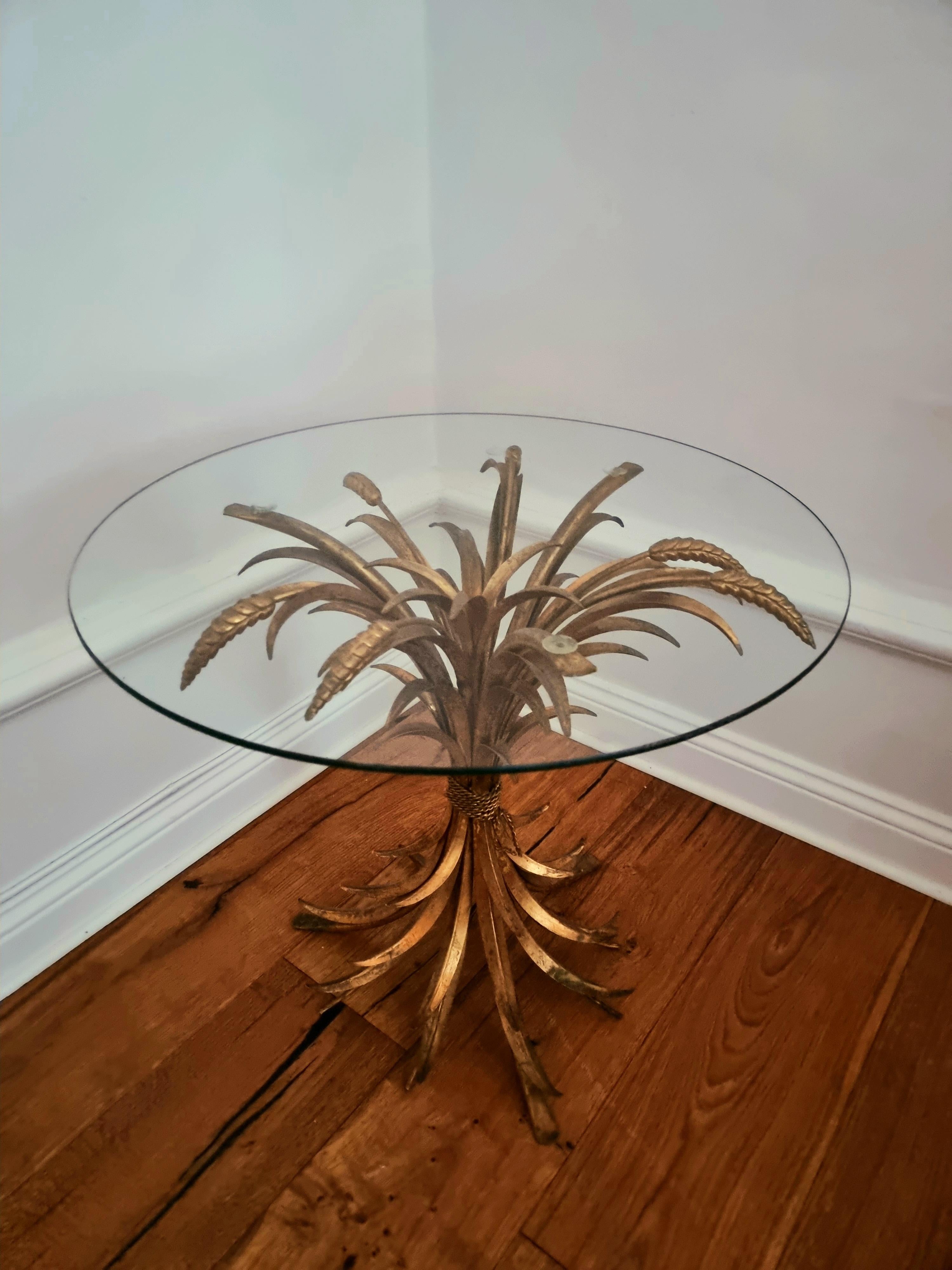 Hollywood Regency side table in gilt metal sheaf of wheat by Hans Kögl 1960/70s.

Coco Chanel had the larger model of this table in her home, therefore the model is called today: Coco Chanel table.

In good condition, normal patina/ signs of age and