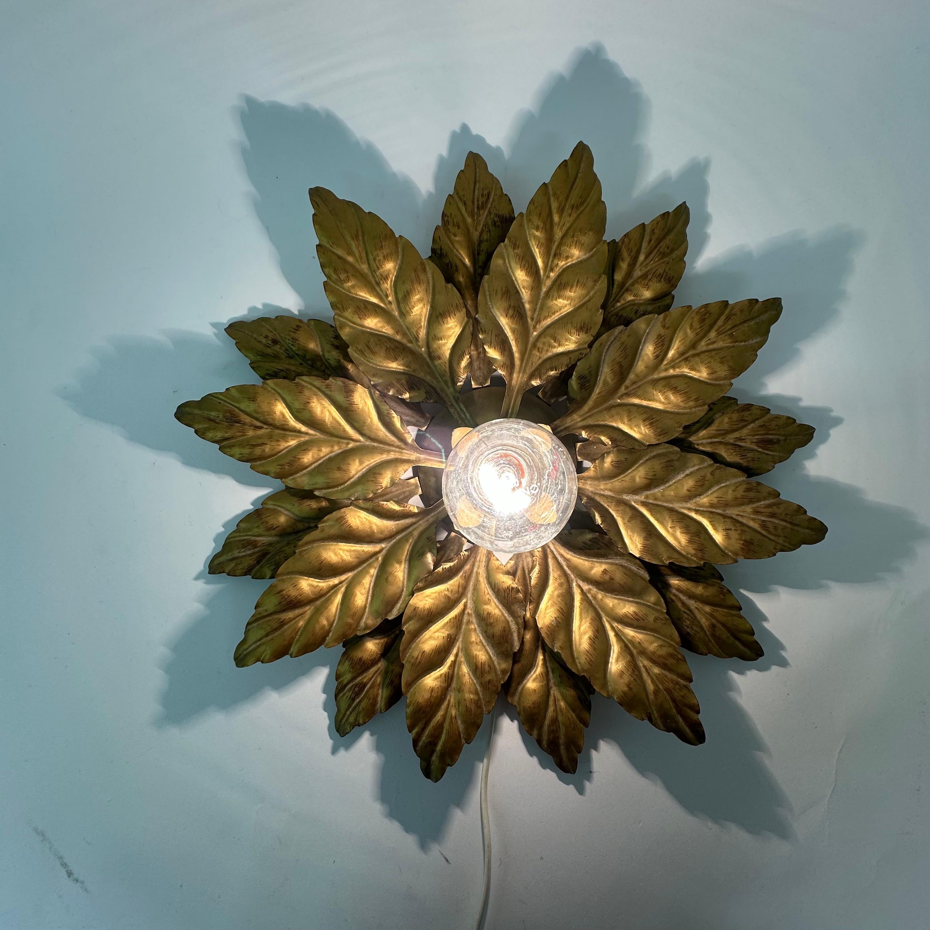 Hans Kögl flush mount / wall lamp leafs , 1970s , Germany

Dimensions: 45cm Diameter, 15 cm Height
Period: 1970’s
Condition: Good
Period: 1970’s
