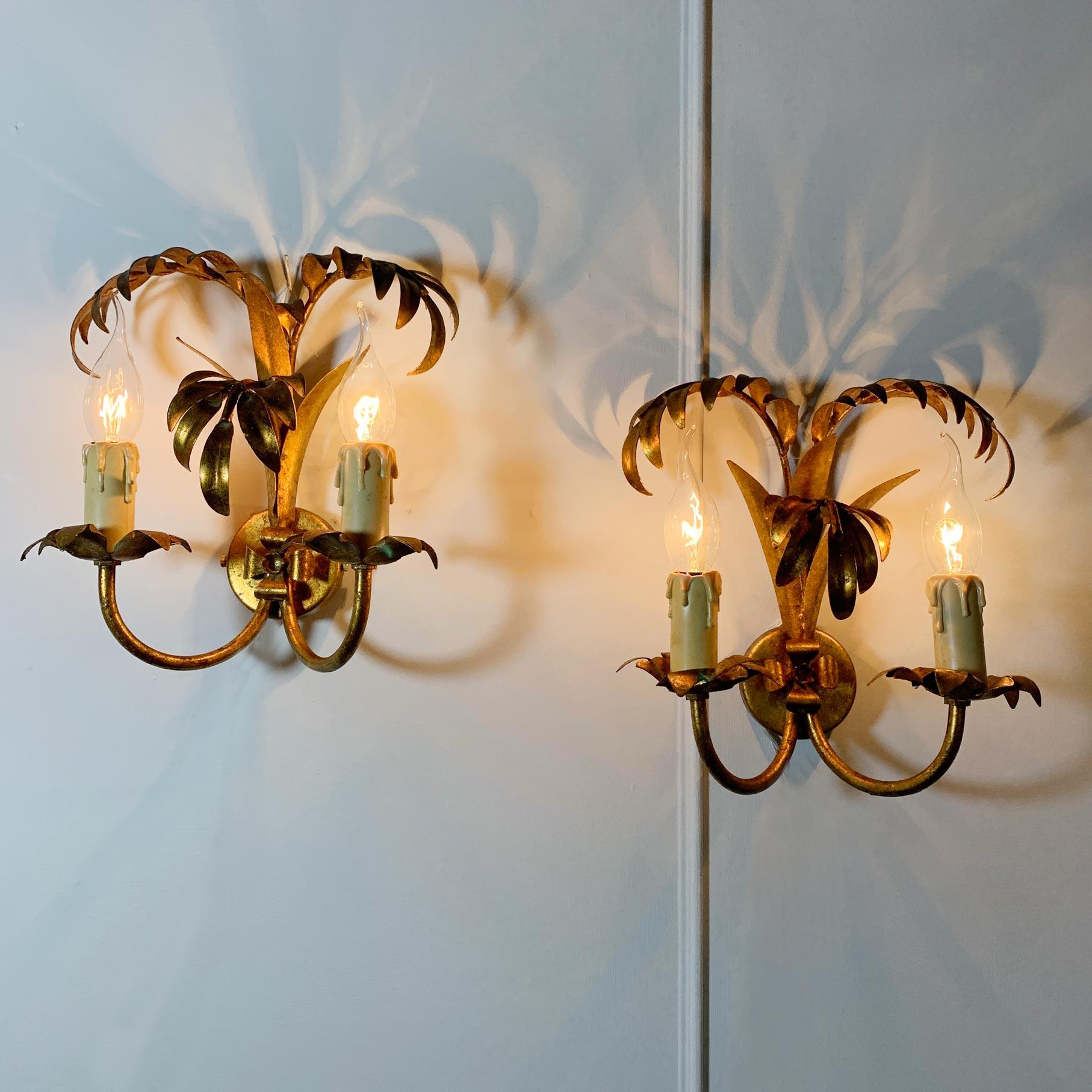 A beautiful pair of gilt metal wall lights, designed by Hans Kogl in the form of palm leaves, each light has two e14 (small screw in) lamp holders, dating to the 1970’s.

Height 28cm x Width 28cm x Depth 18cm

Back Plate is 7.5cm
