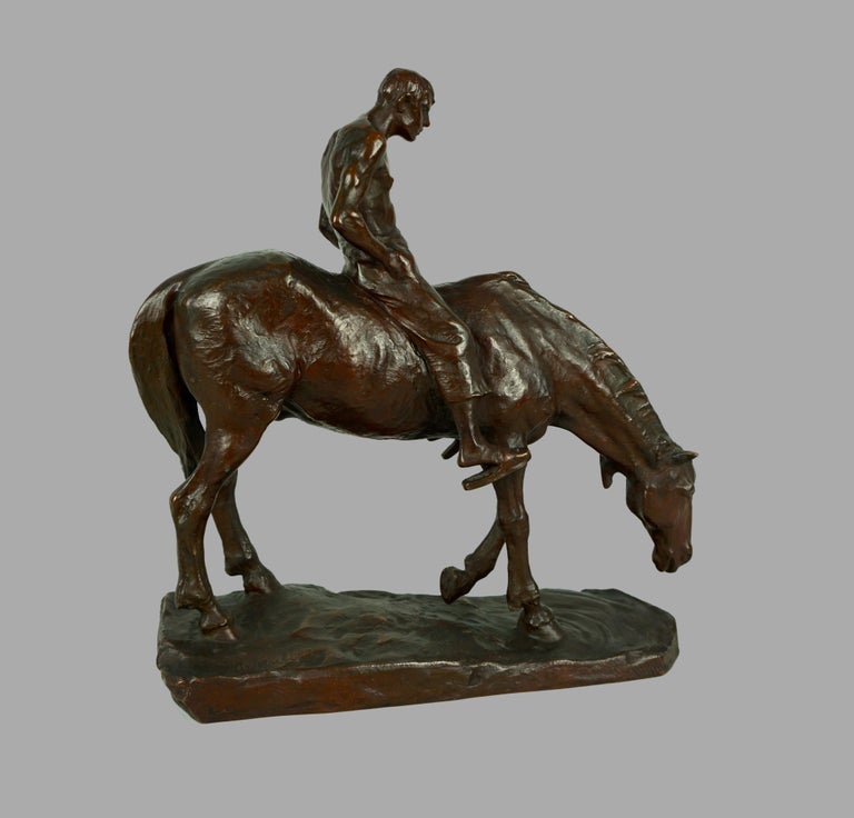 Hans Muller (German 1873-1937) An evocative early 20th century bronze of a horse and rider, the horse stooping to drink, the shirtless man mounted in a relaxed manner. Raised on a naturalistic base and inscribed 