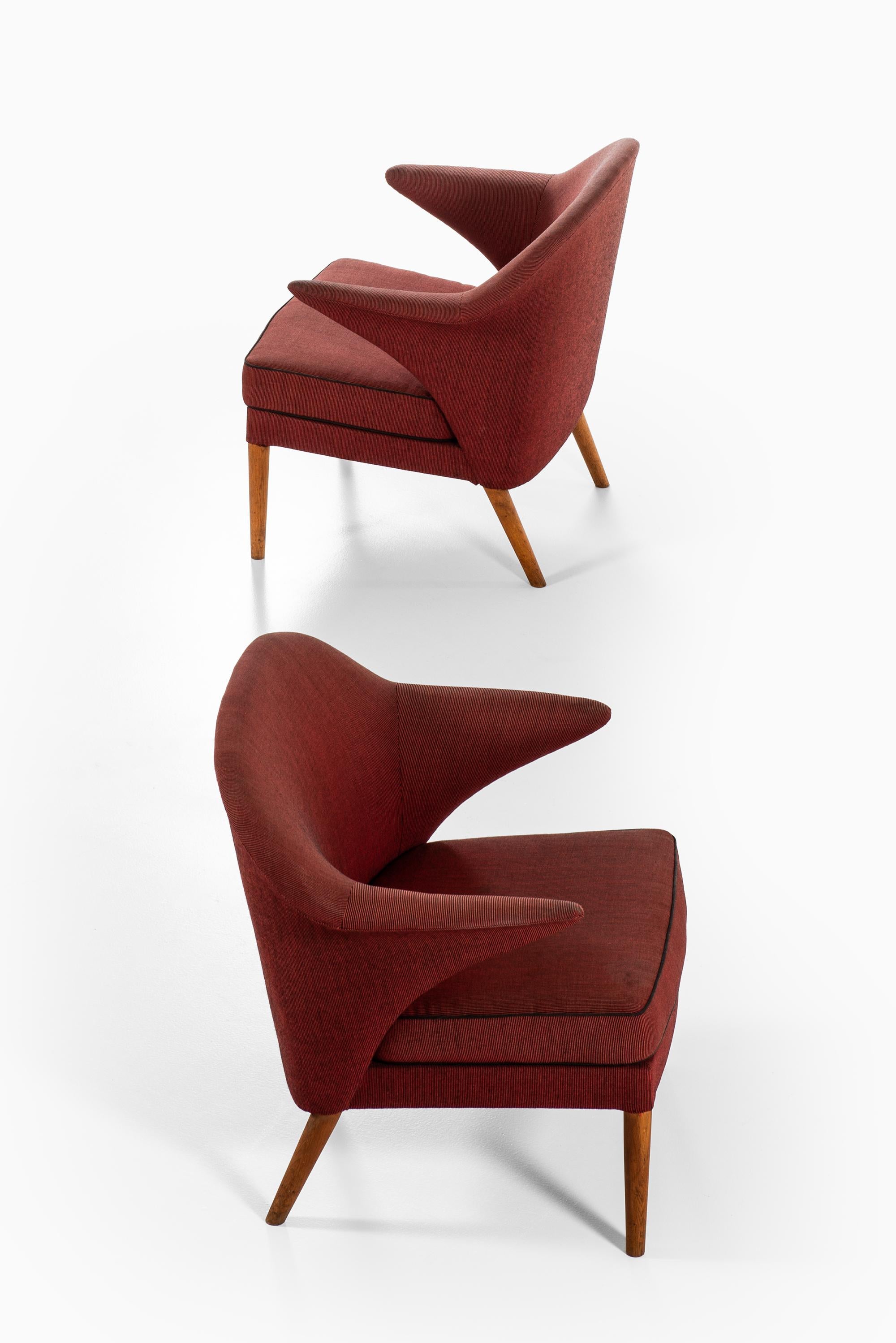 Hans Olsen zugeschriebenes Paar Sessel:: hergestellt in Dänemark (Eichenholz) im Angebot