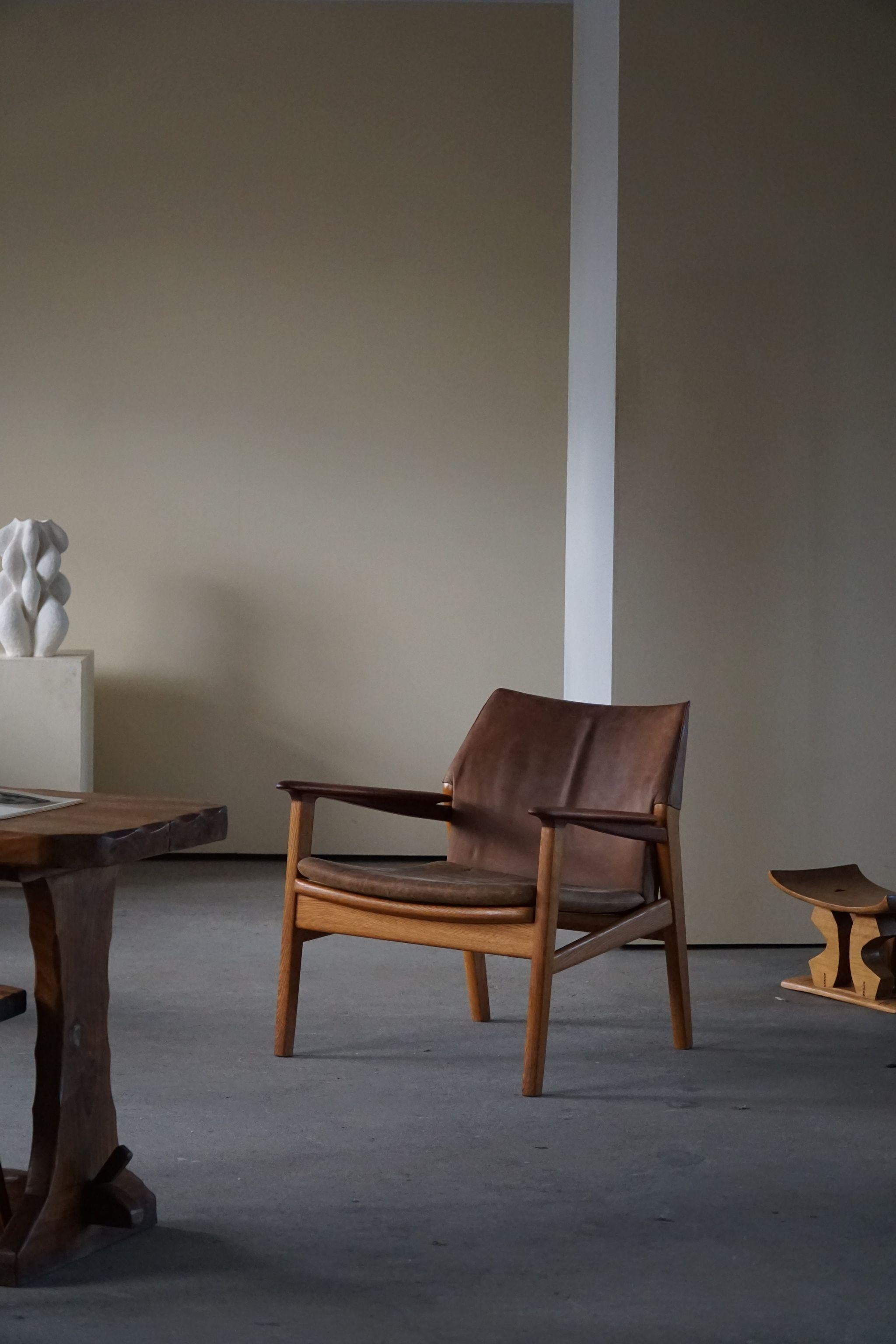 Easy chair in oak and teak with upholstery in suede. Designed by Danish designer Hans Olsen, made by Swedish company Gärsnäs Möbler in 1960s. Model 
