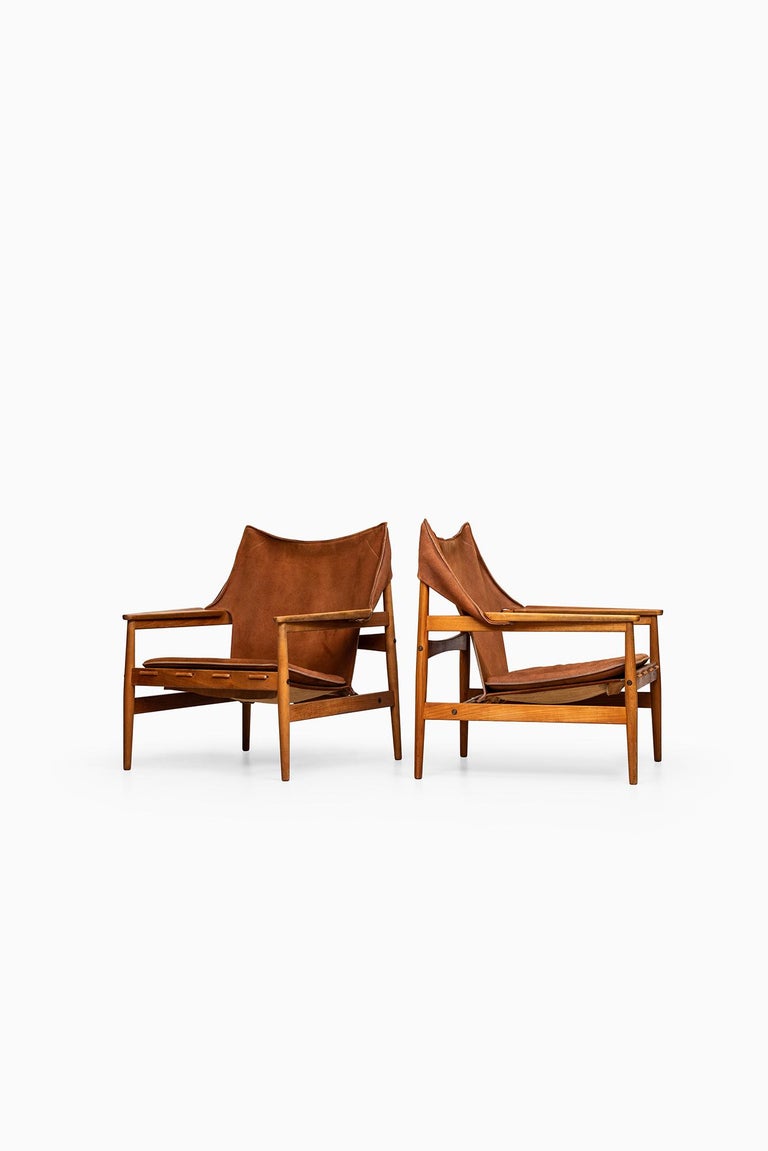 Rare easy chairs designed by Hans Olsen. Produced by Viska Möbler in Kinna, Sweden.