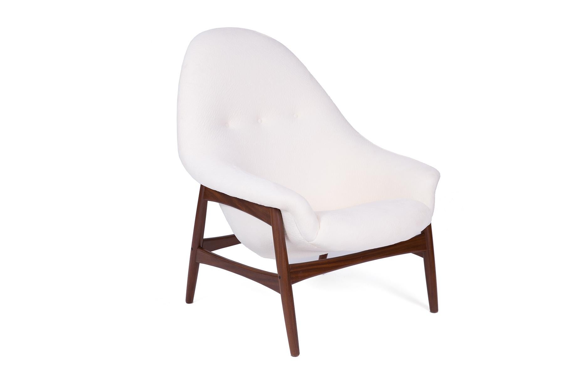 Hans Olsen for Bramin sculptural pair of lounge chairs circa early 1960s. This pair features tapered walnut frames and new plush off-white upholstery. Price listed is for the pair.