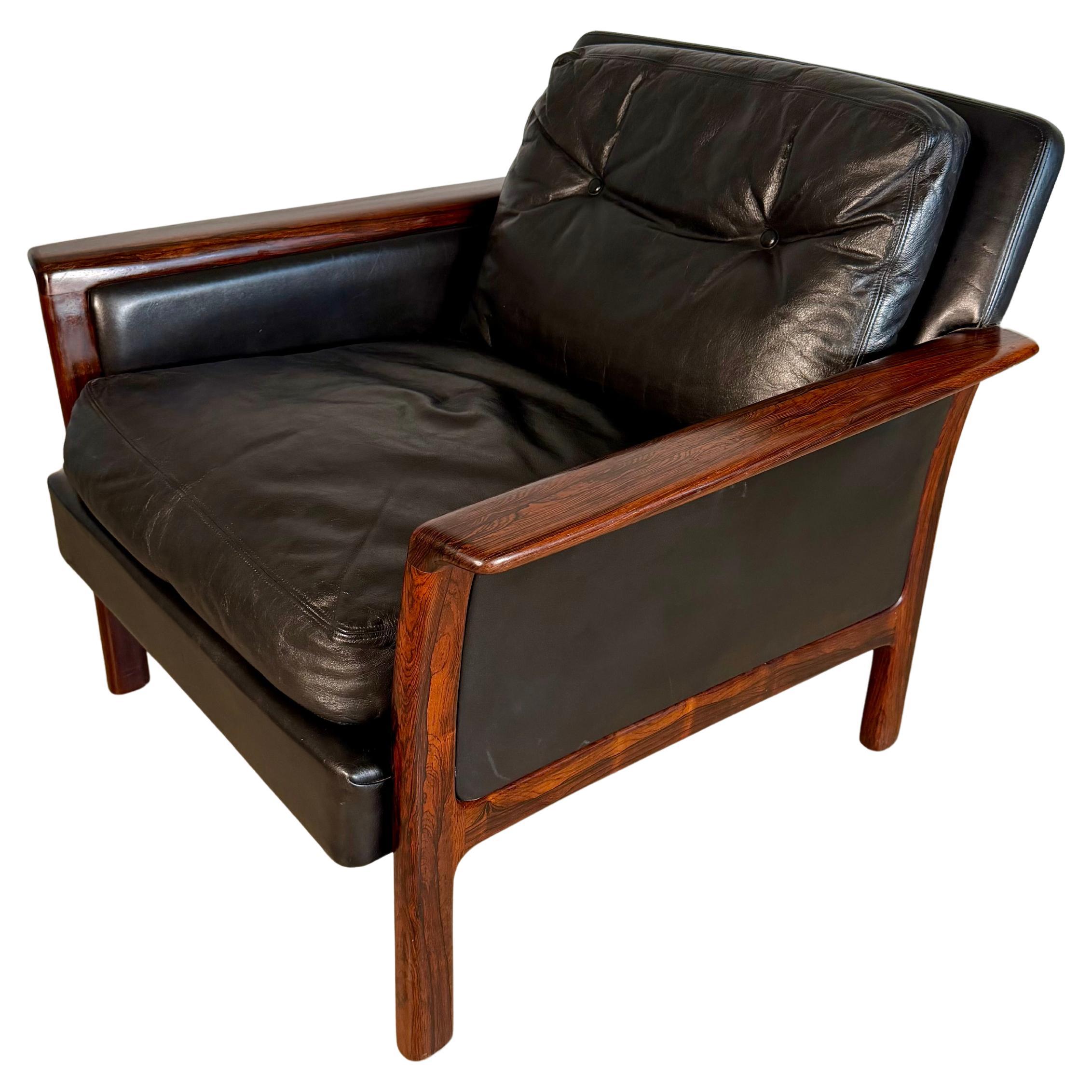 Hans Olsen for Bröderna Andersson Rosewood and Black Leather Chair en venta