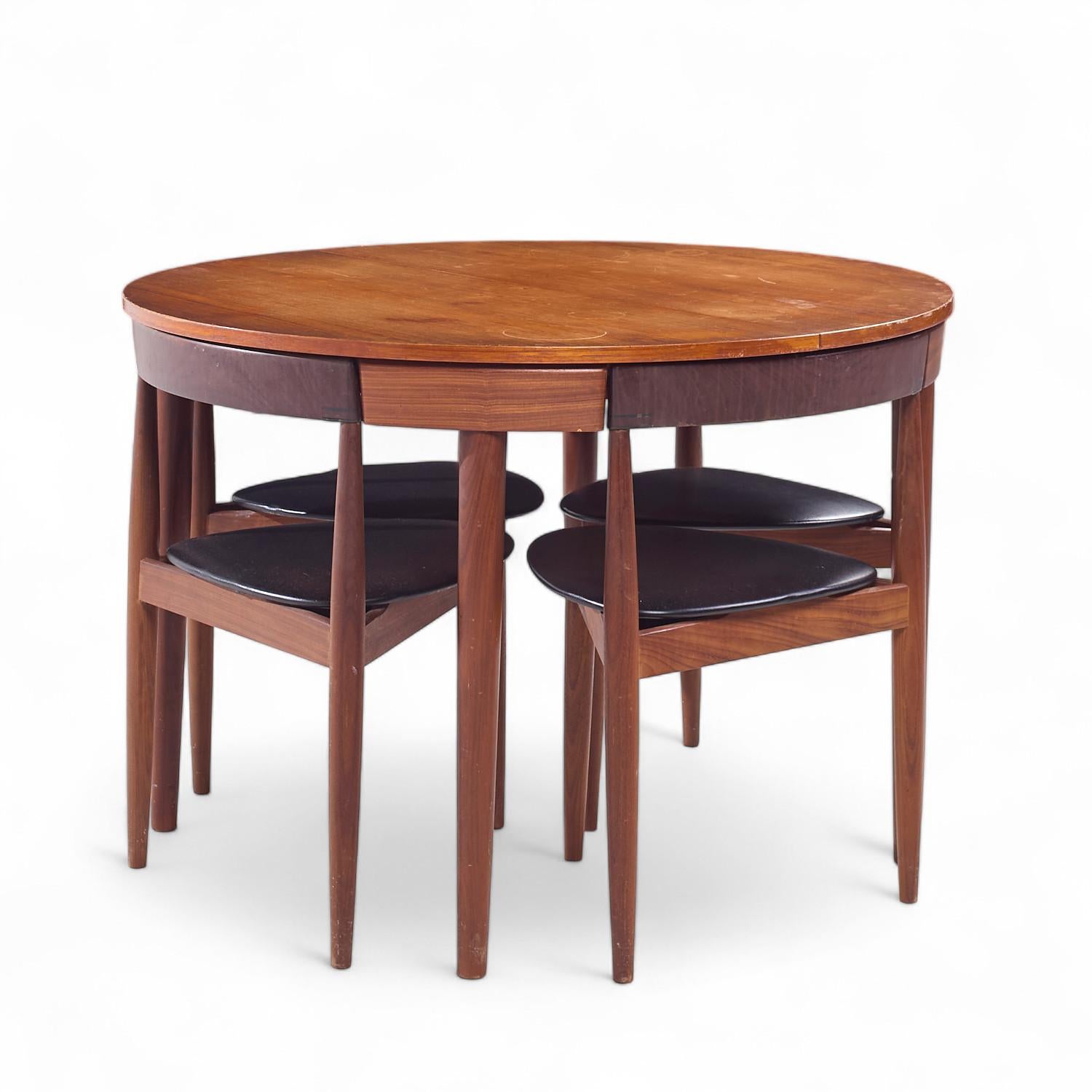 Danish Hans Olsen for Frem Rojle Expanding Teak Dining Table with 4 Nesting Chairs For Sale