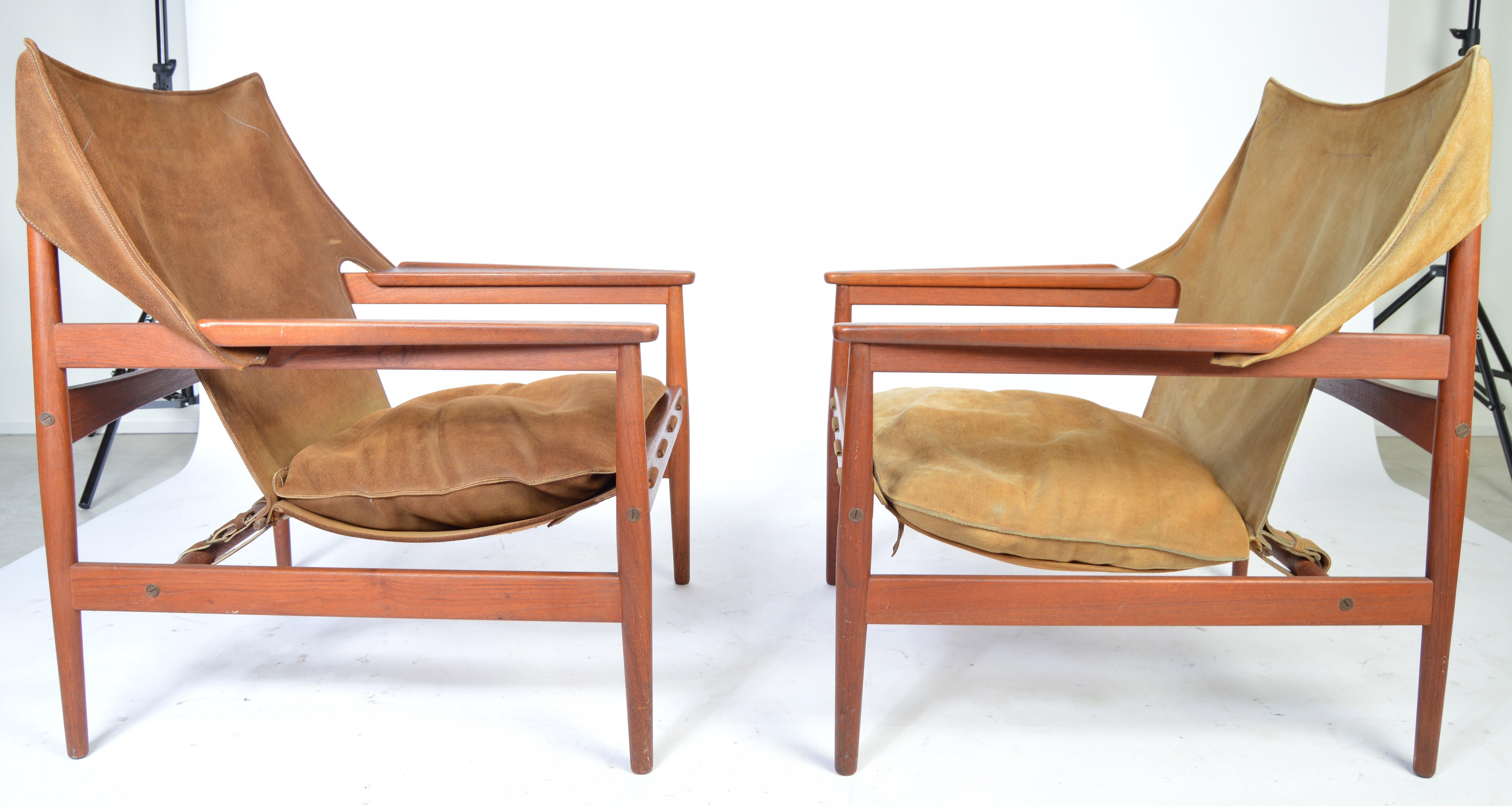 A pair of 'Kinna' easy chairs designed by Hans Olsen for Viska Mobler in Sweden having teak frames with suede seats and backrests.
Both signed and in very good vintage condition.