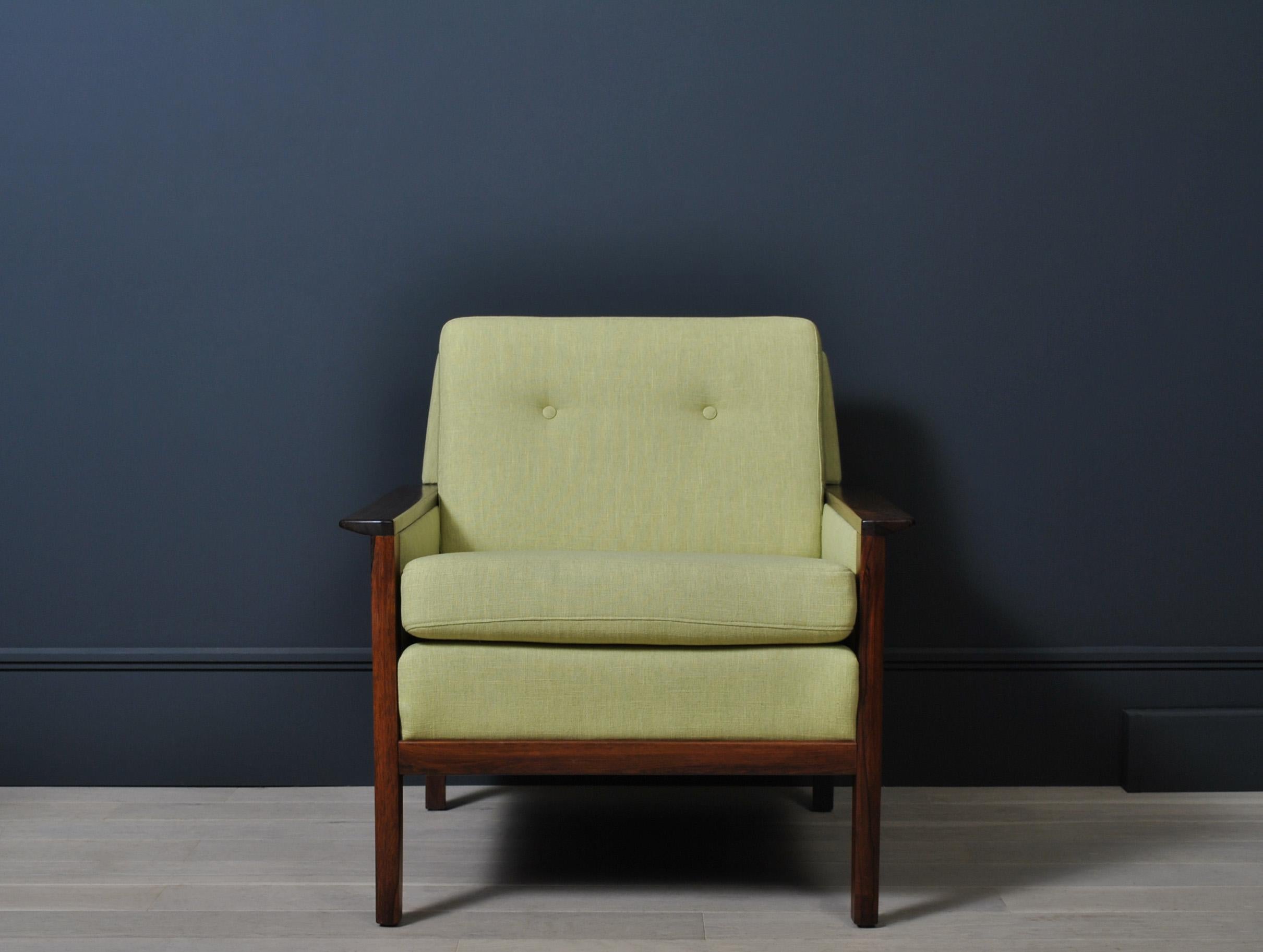 A fully reupholstered Danish midcentury lounge chair by Hans Olsen. Produced by CS Mobler, Denmark, circa 1950s. Wonderful angled wing arm frame. The entire chair has been completely reupholstered from scratch in Linwood linen fabric.
Classic