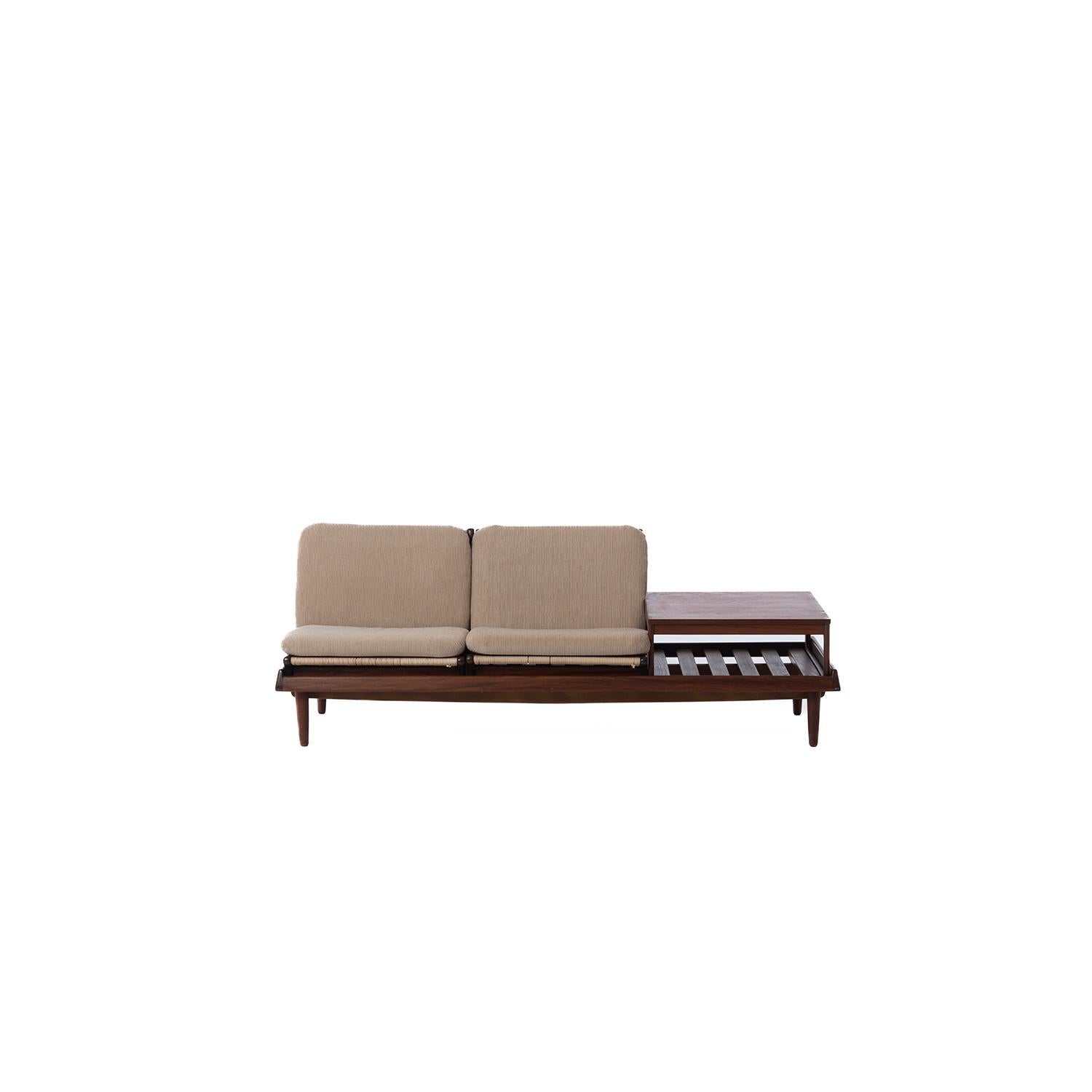A Danish modern sofa designed by Hans Olsen. Modular seats and side table can be reconfigured to different options. Platform can double as daybed by laying the seat cushions down. Rope woven seats. Newly upholstered. Restoration of the frame will be
