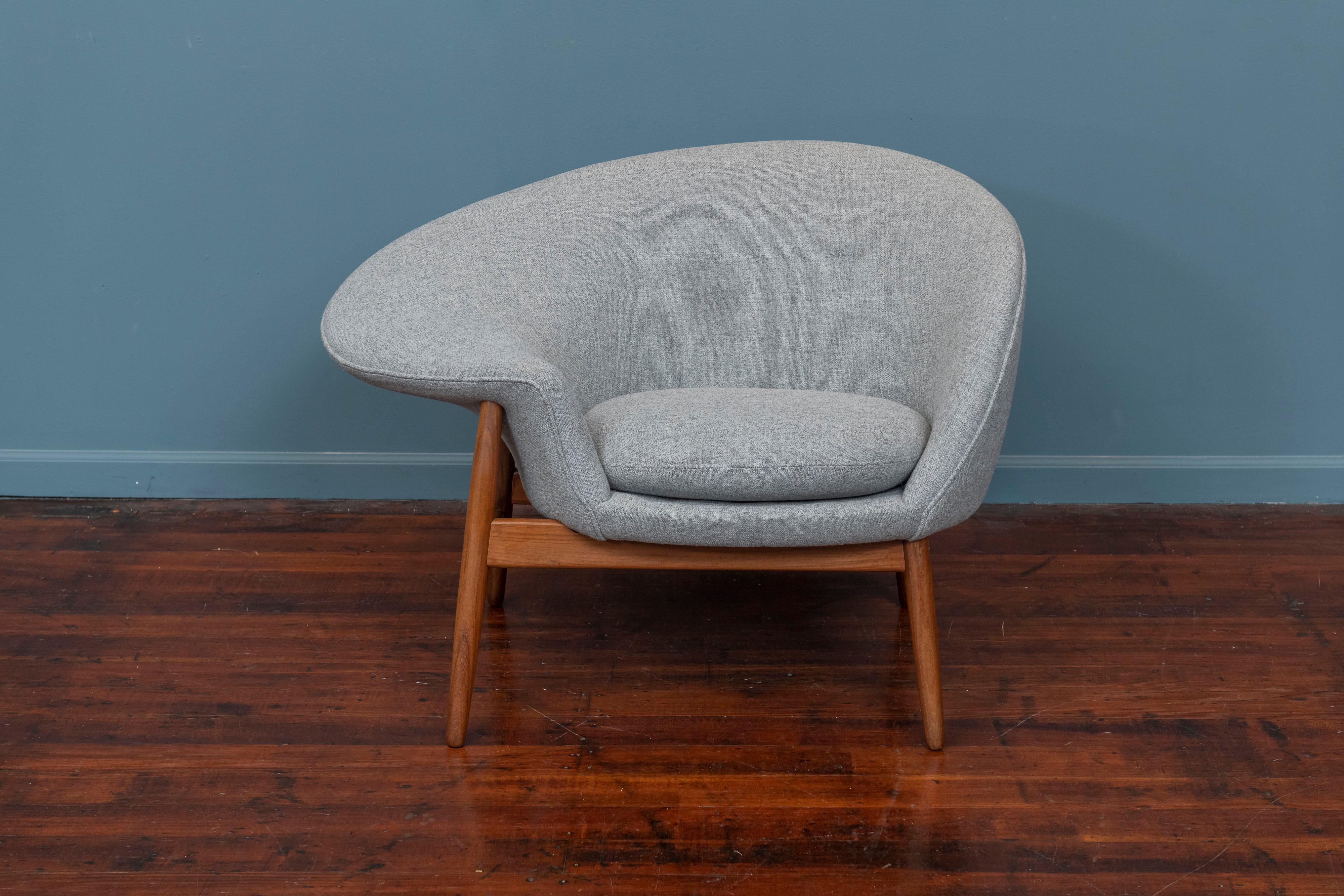 Hans Olsen design original vintage Fried Egg chair for Bramin, Denmark. Unique and rare design lounge chair that can be sat in either sideways with your feet up over the side or straight ahead. 
Newly refinished teak wood frame with new light grey