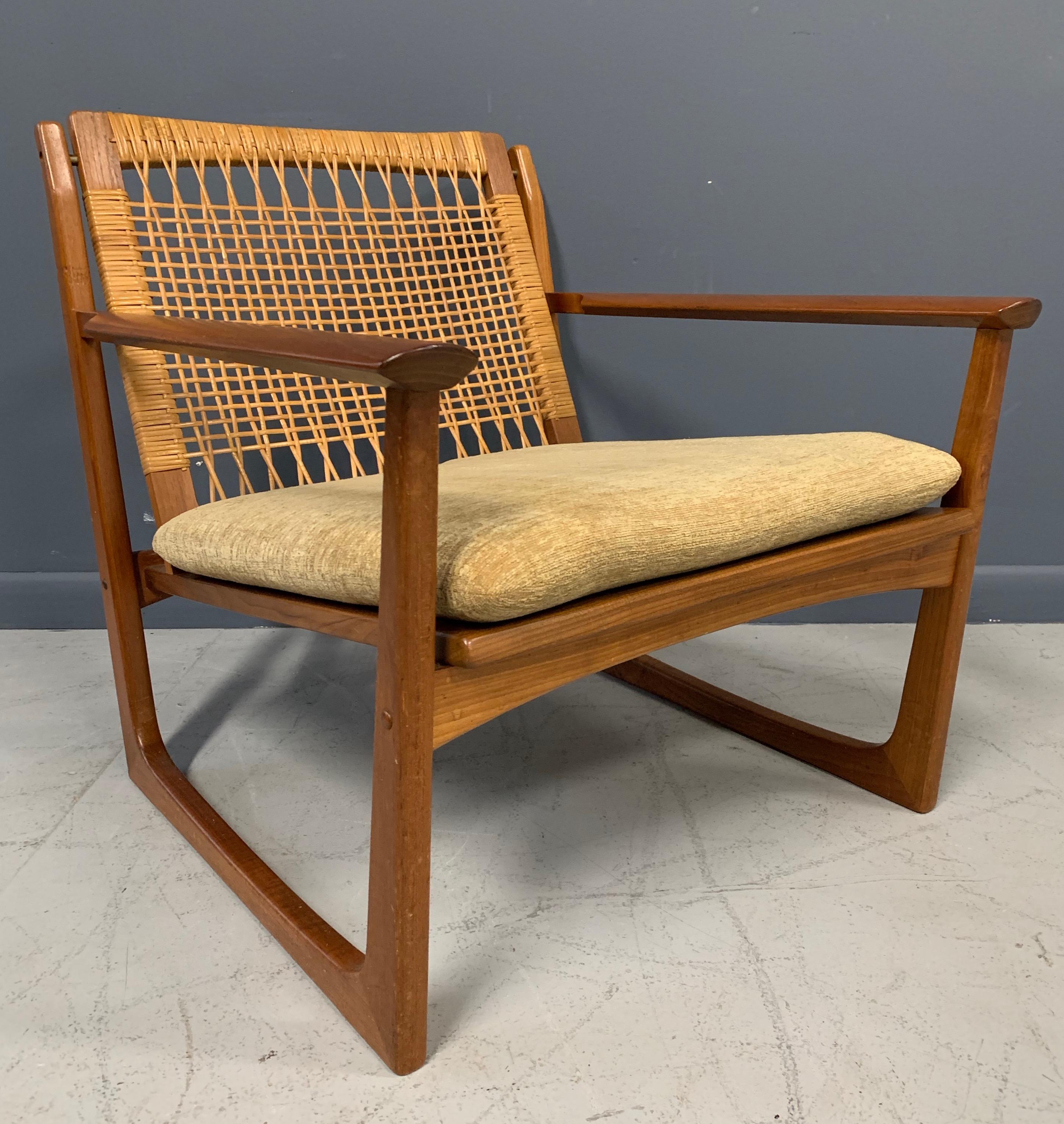 Teak and cane chair designed by Hans Olsen, produced by Juul Kristensen in Denmark.