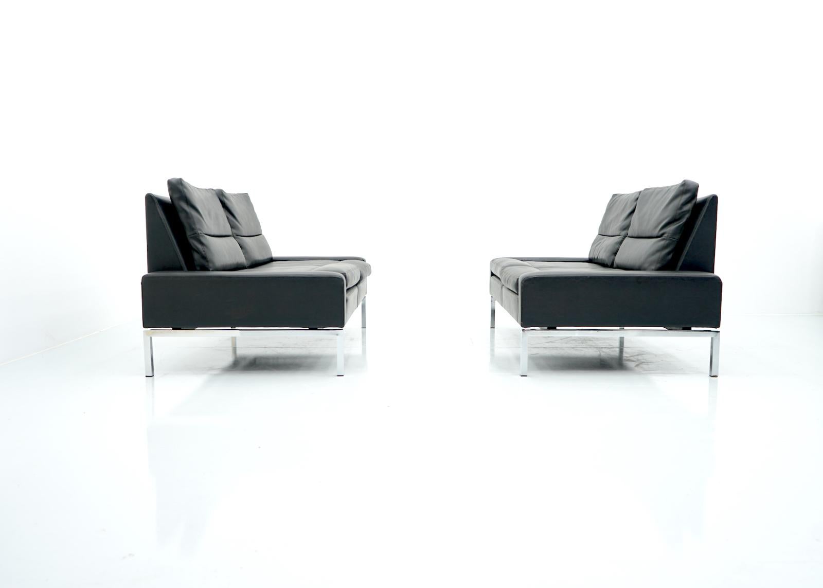 One of two available black leatherette 2-seater sofas with chrome base by Hans Peter Piehl for Wilkhahn, Series 800, Germany 1968.
Two sofas are available.
Good to very good condition.
Dimensions: Height: 29.52 in. (75 cm) width: 52.36 in. (133