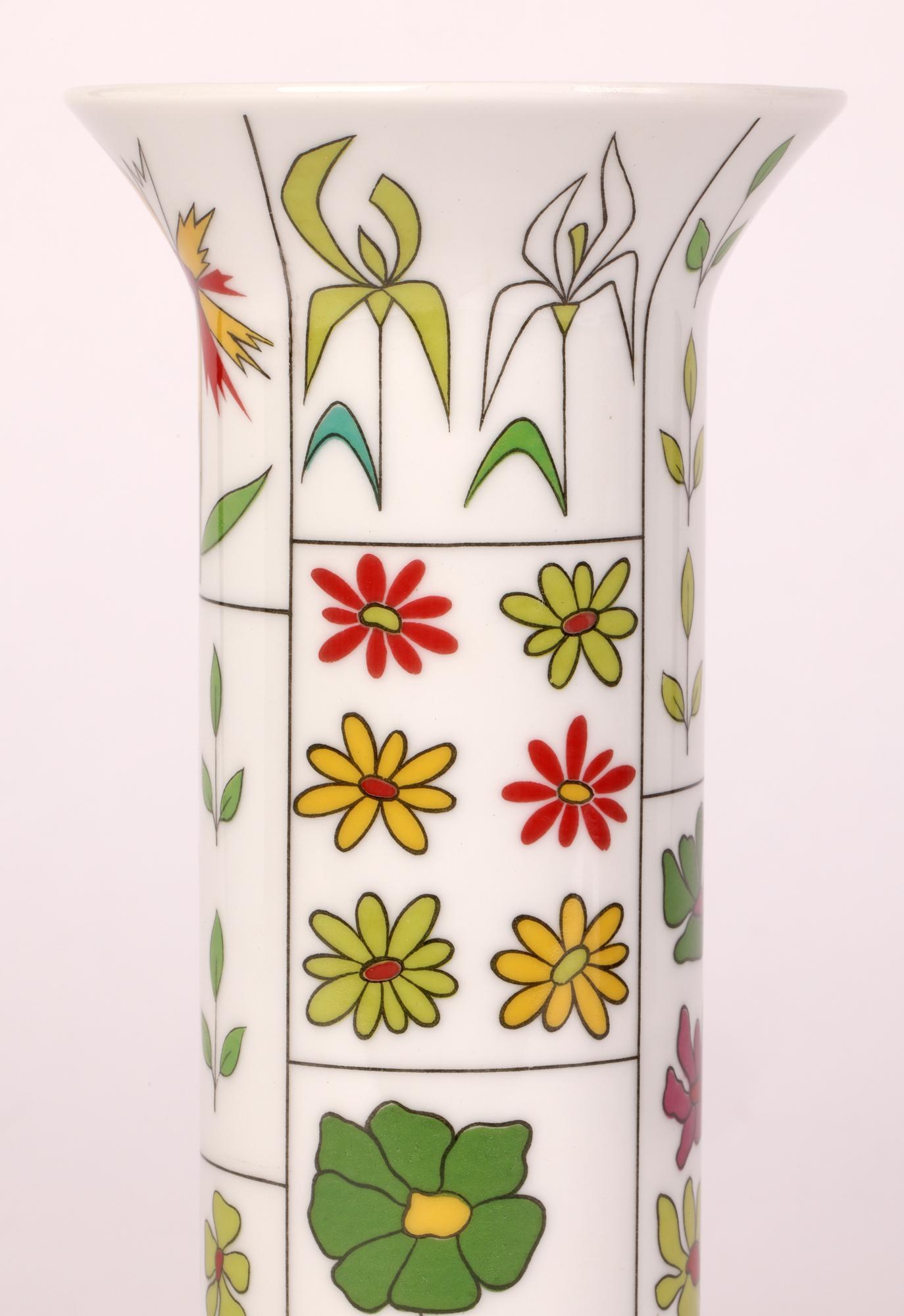 A stylish German Rosenthal Studio-Linie Berlin design porcelain vase decorated with floral designs by Hans Theo Baumann (Swiss, 1924-2016) dating from the 1970’s. The vase is of simple tall narrow cylindrical form with a trumpet shaped top and is
