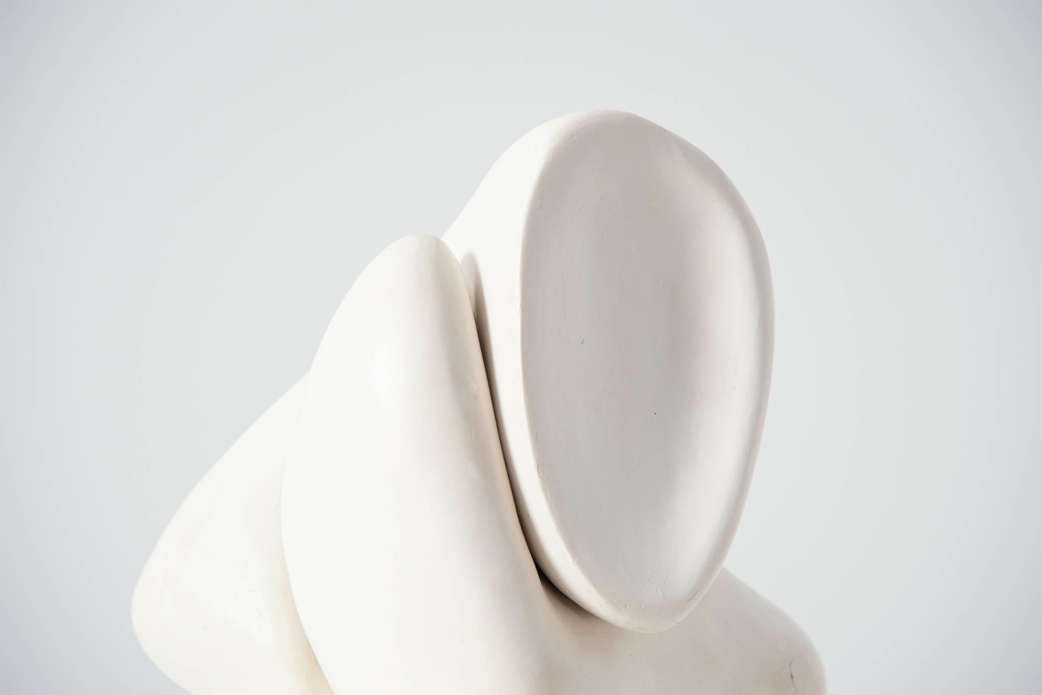 Beautiful abstract shaped plaster sculpture, made and sculpted by Hans van Eerd, Holland 1976. This sculpture was aquired directly from the artist who kept some of his best works from his early period, this was one of them. It is made of white