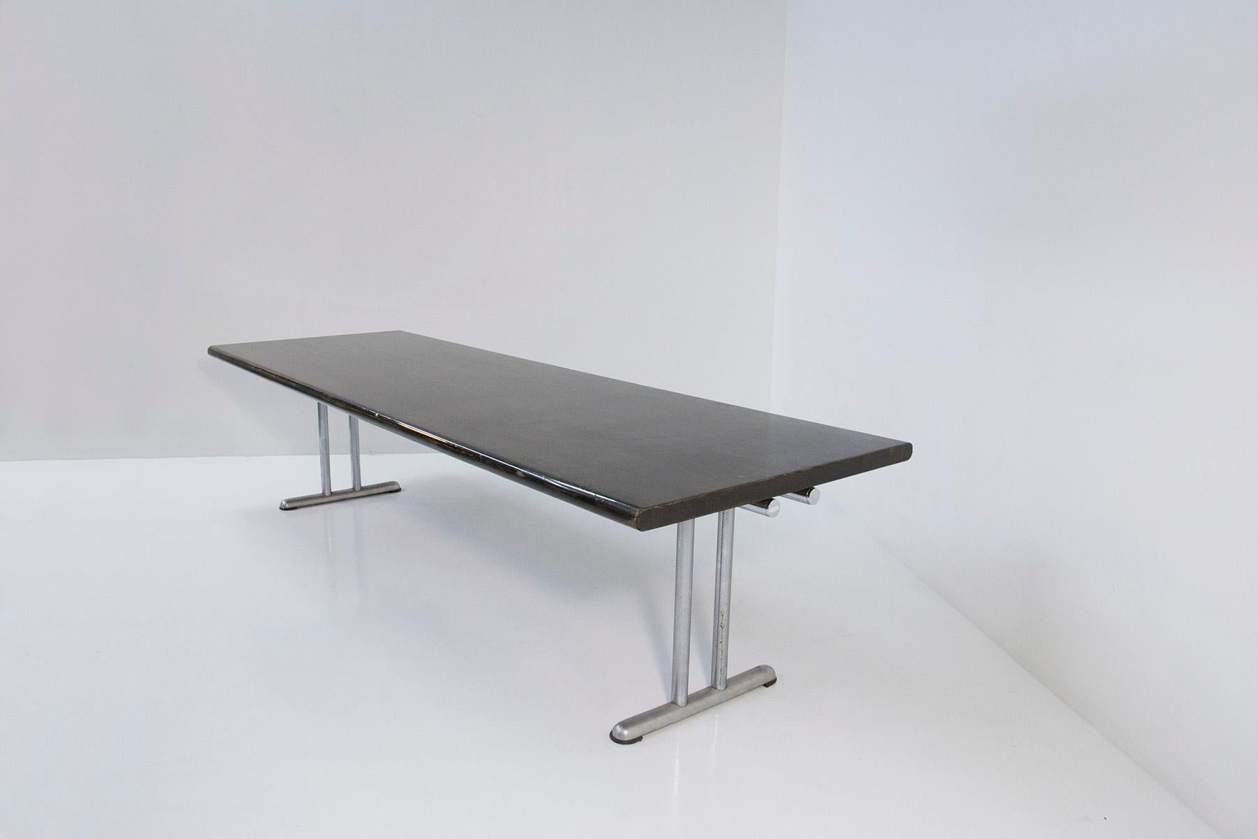 Large dining table designed by Hans von Klier and Ettore Sottsass for Rossi di Albizzate in the 1960s. 1960s early 1970s. The table is part of the Sit System Series. The table is made with a tubular steel frame. Its tabletop, on the other hand, is