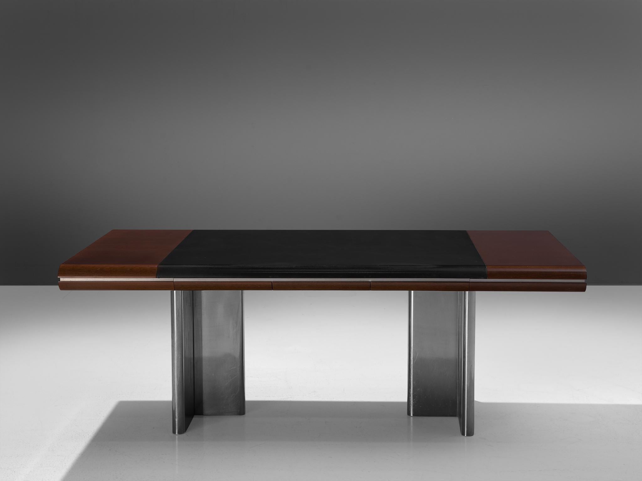 Hans Von Klier for Skipper, office table, mahogany, leather and metal, Italy, 1970s.

Modern desk designed by Hans Von Klier for Skipper, Italia. The table consists of a rectangular shaped wooden top with a steel strip and inlayed with black