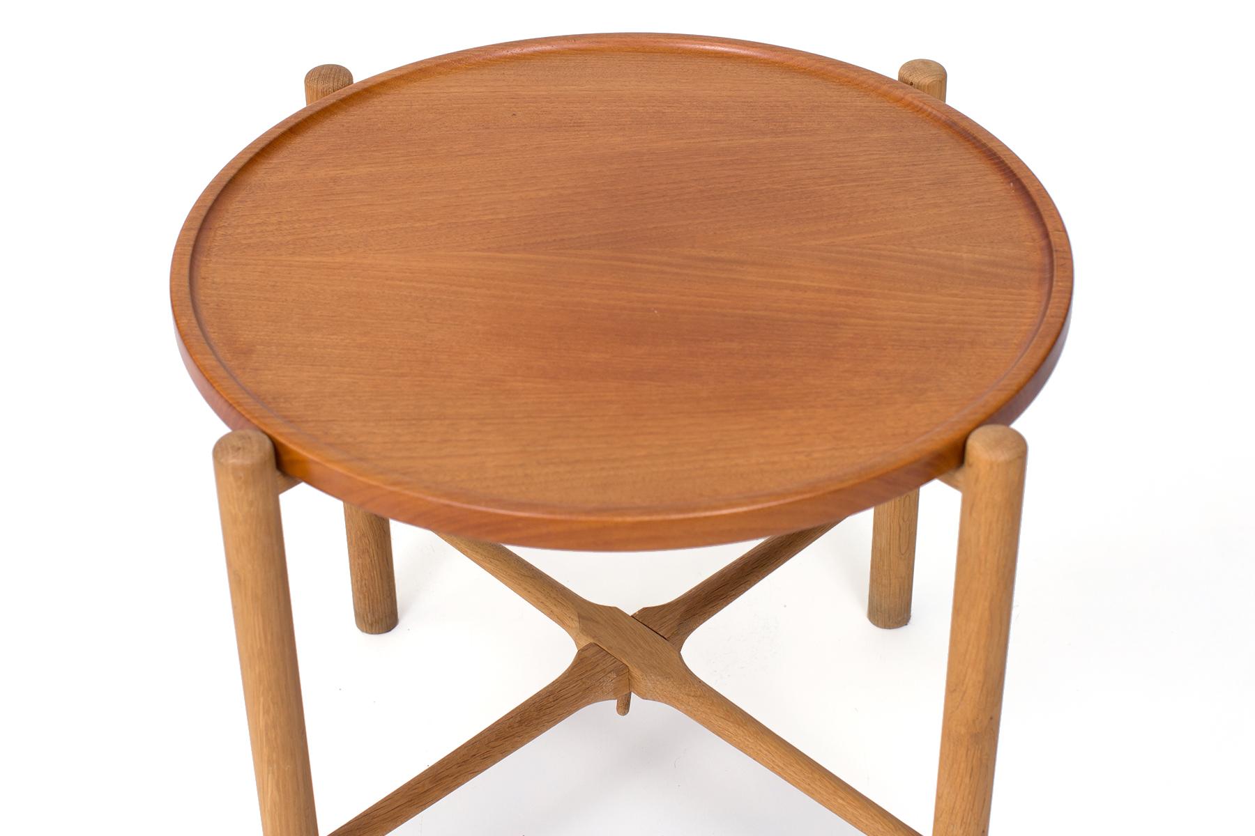 Hans Wegner for Andreas Tuck side table, circa late 1950s. This all original example has a collapsible base and removable top. It is executed in teak and beech.