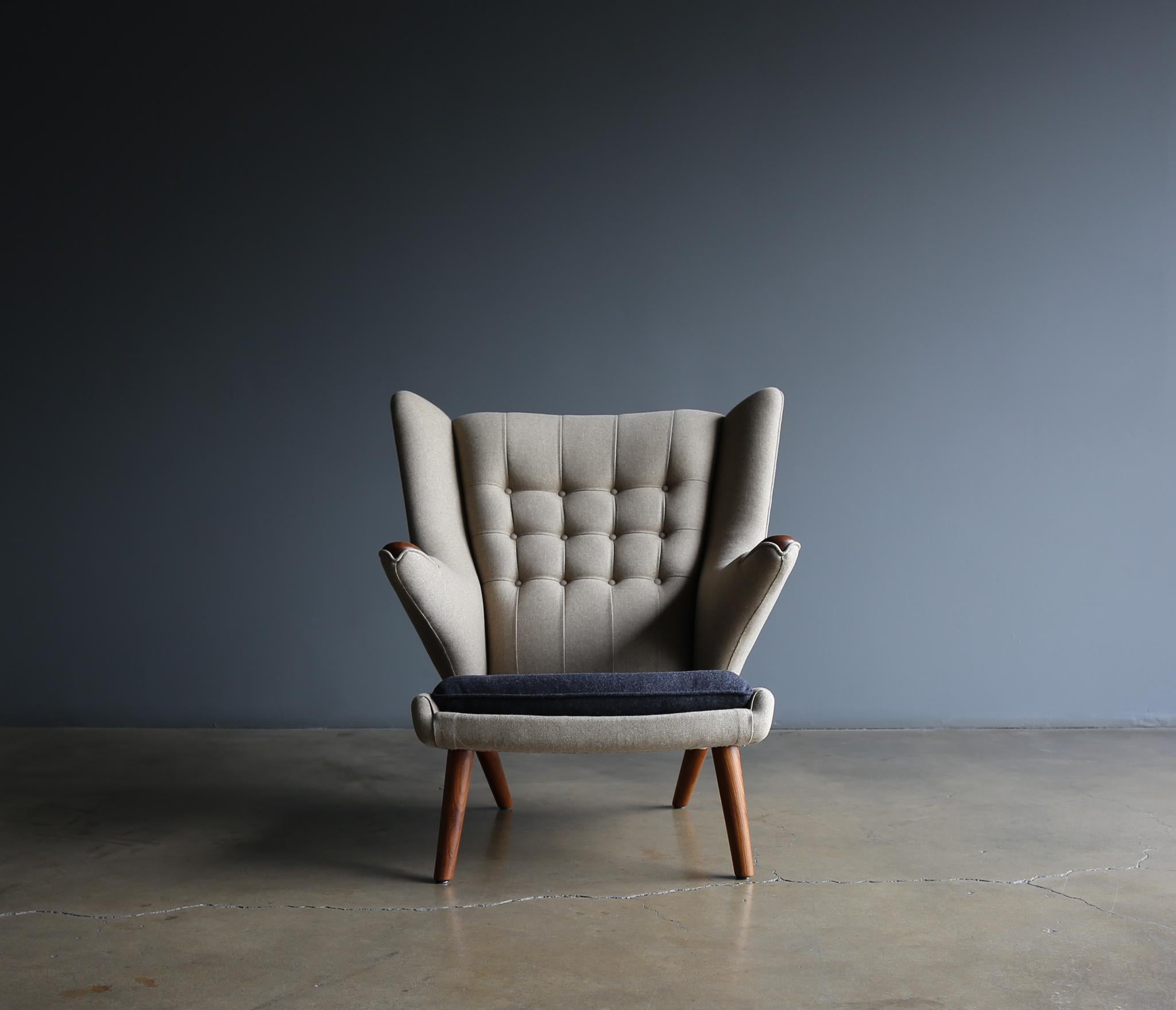 Hans Wegner AP-19 papa bear chair for A.P. Stolen, Denmark, circa 1952. This piece has been expertly restored in Kravet Couture tan & gray wool upholstery. A.P. Stolen Makers stamp to the bottom.