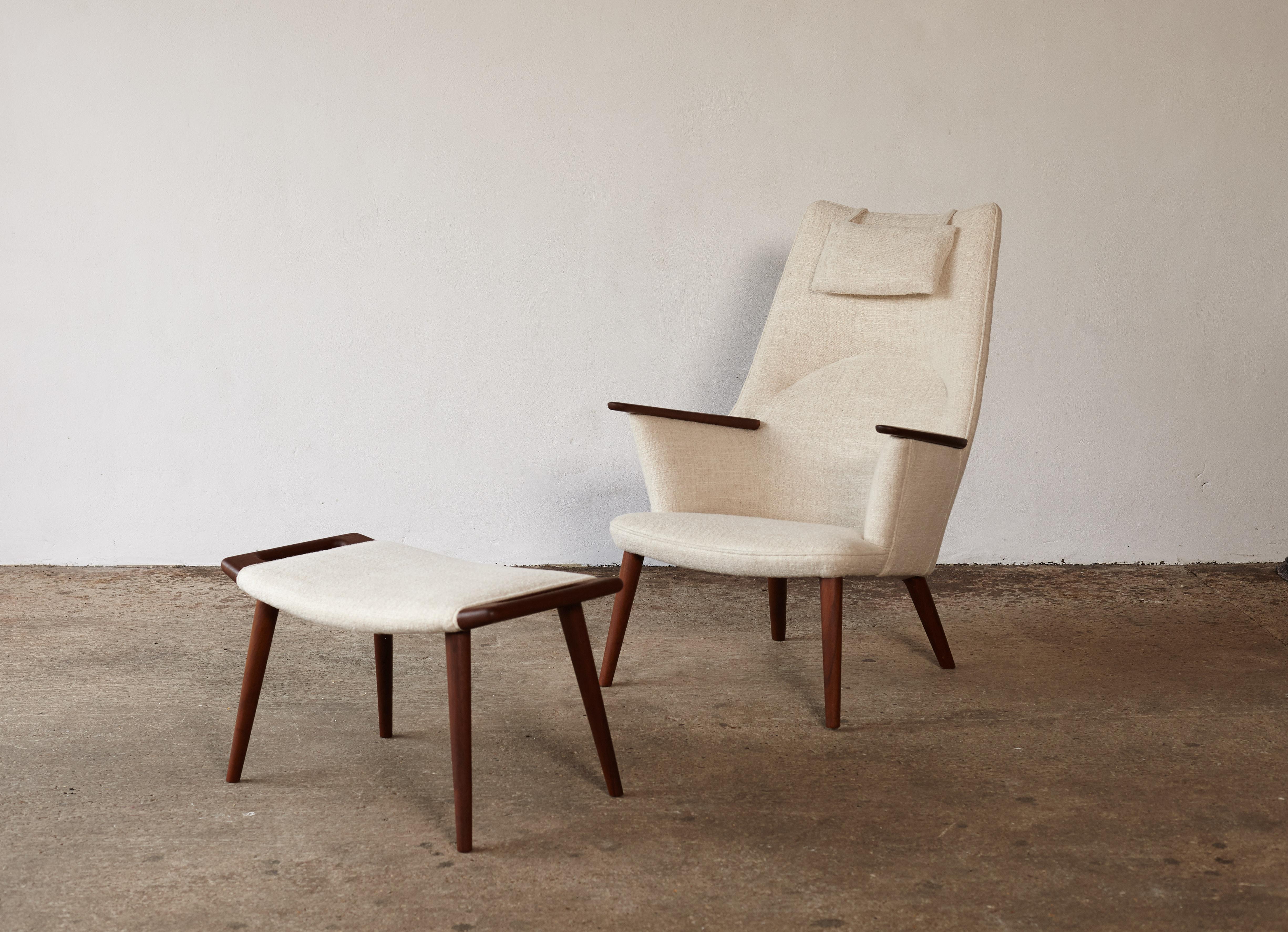 A wonderful Hans Wegner AP-27 chair (sometimes called Mama Bear Chair) and ottoman, AP Stolen, Denmark, 1950s. Recovered in Pierre Frey fabric. Very good condition. Stamped with makers mark.  Ships worldwide.