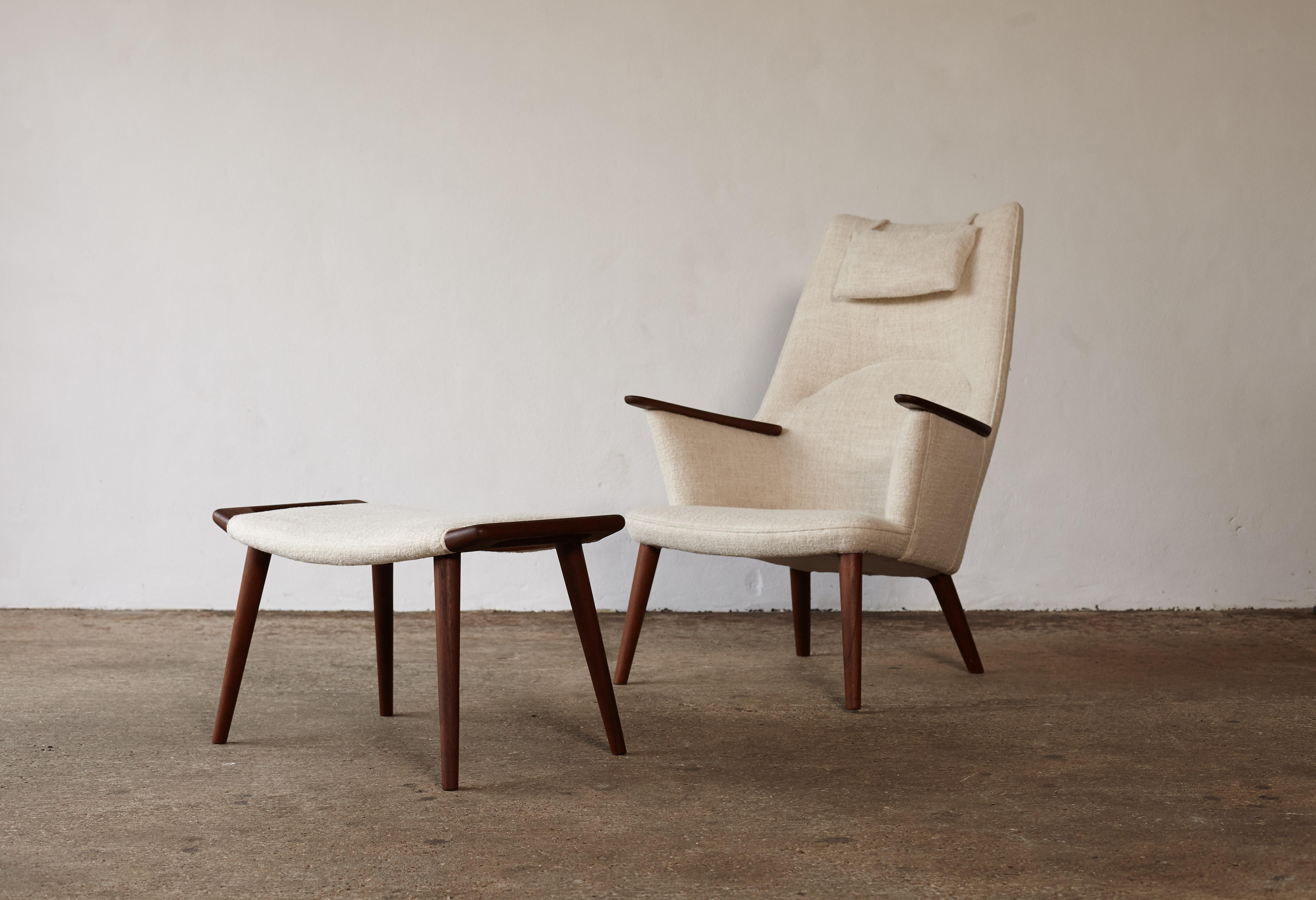 A wonderful Hans Wegner AP-27 chair (sometimes called Mama Bear Chair) and ottoman, AP Stolen, Denmark, 1950s. Recovered in Pierre Frey fabric. Very good condition. Stamped with makers mark.