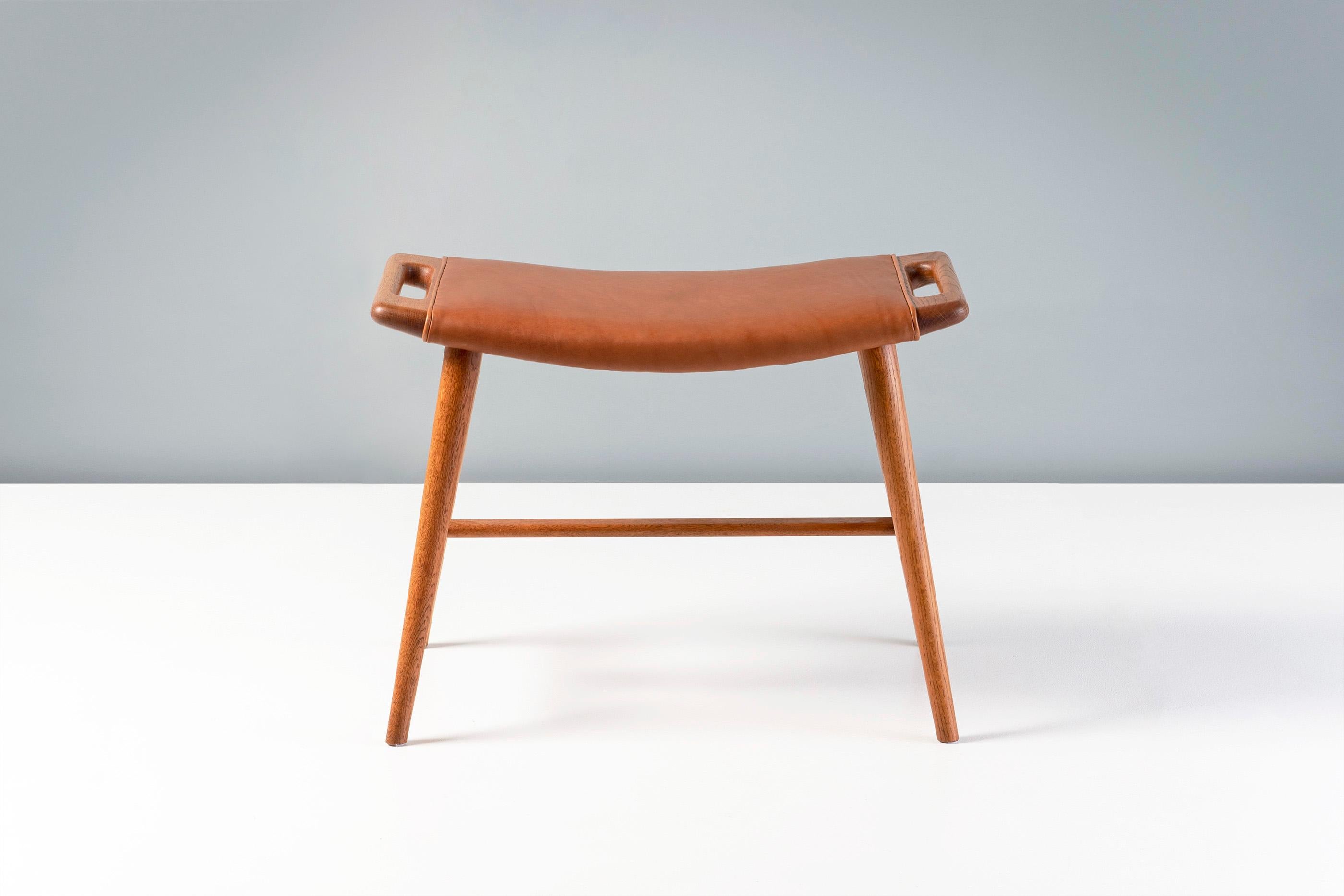 Hans Wegner - AP-30 Piano Stool, 1957

Produced by A.P. Stolen in Denmark, this model was an evolution of the AP-29 Papa Bear ottoman. The rarely seen piano stool has an additional cross-bar and longer legs creating a taller overall height. This