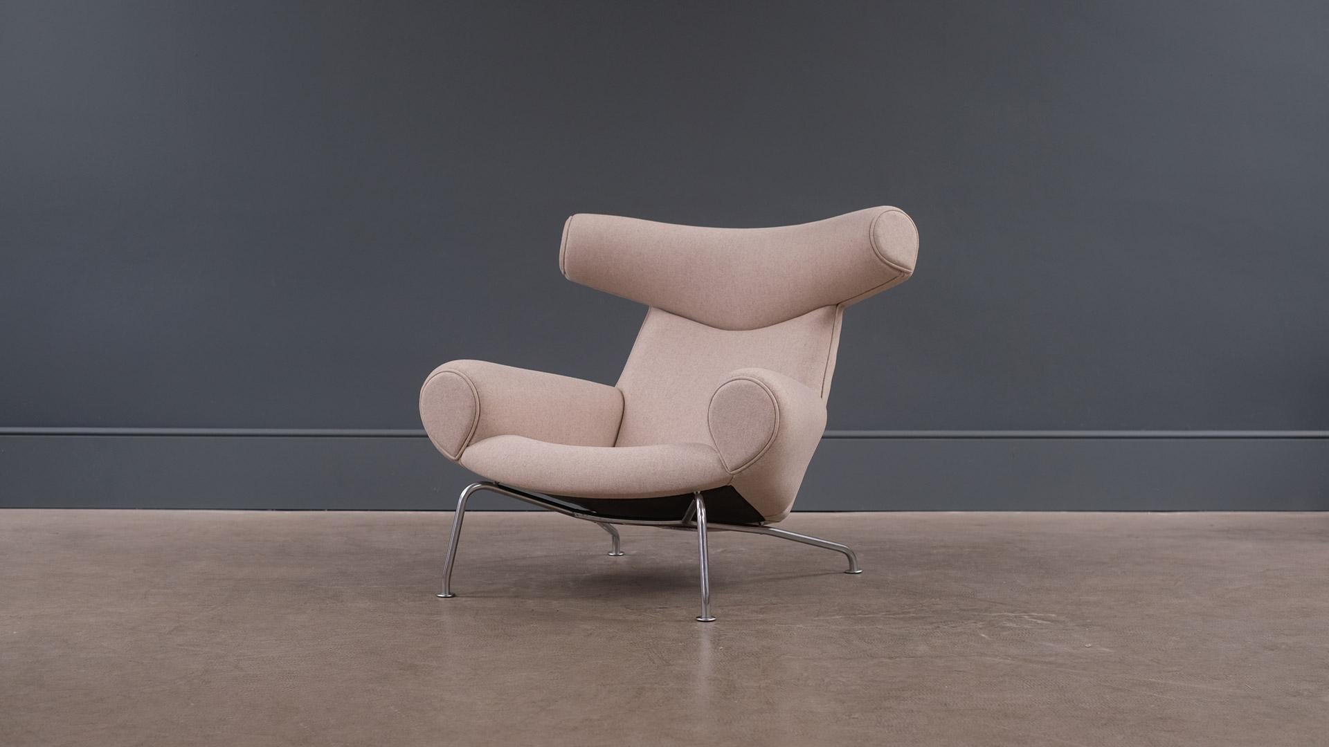Amazing original Ox chair, model AP46, designed by Hans Wegner for AP Stolen, Denmark, 1960. Early example fully refurbished and reupholstered in grey / beige wool by Warwick. Wonderful and ultra rare piece of super collectable Hans Wegner