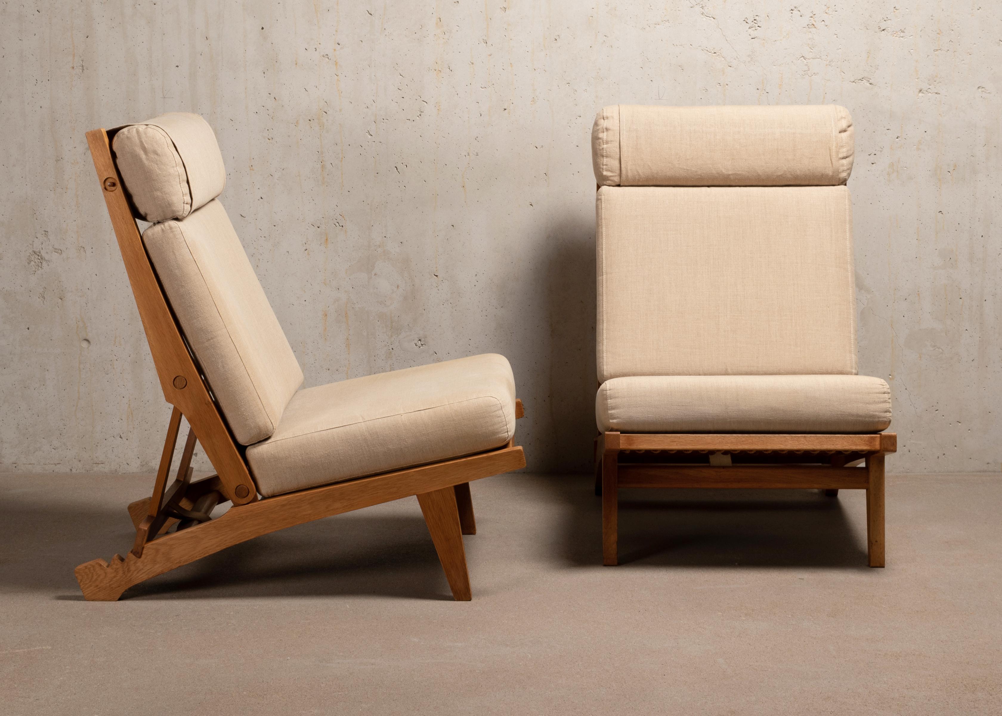 For Shawn, CA
Comfortable Hans Wegner AP71 folding lounge chairs designed in 1968 with adjustable back- and headrest in three positions. Solid oak frame with beautiful details in very good condition. New canvas cushions.